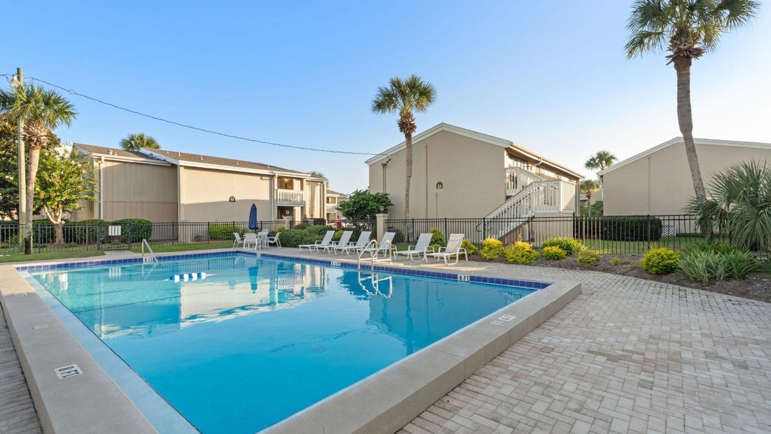 Steps from the Sand Bright Coastal Stay w Pool Access Coastal Hideaway by AvantStay