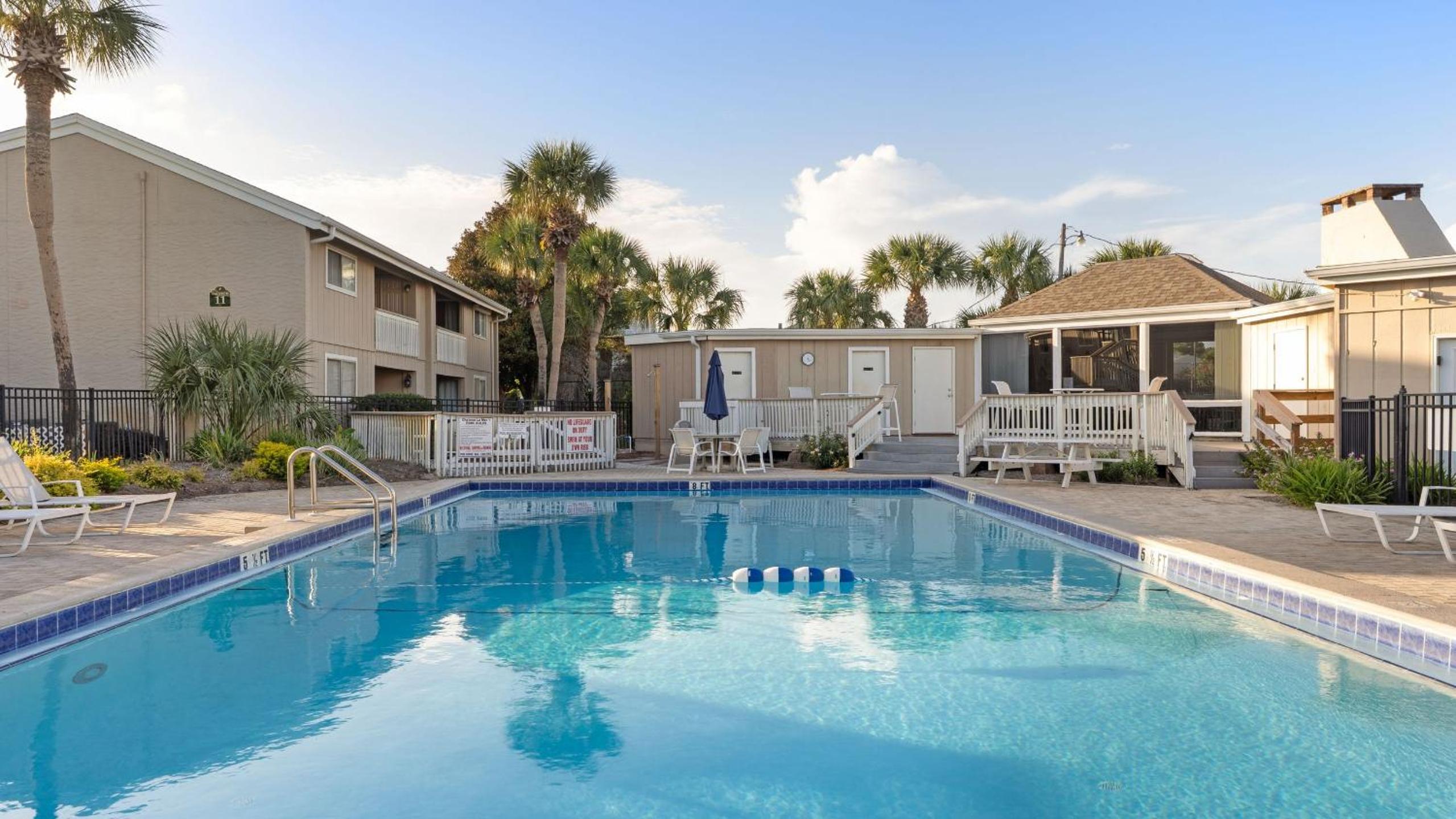 Steps from the Sand Bright Coastal Stay w Pool Access Coastal Hideaway by AvantStay