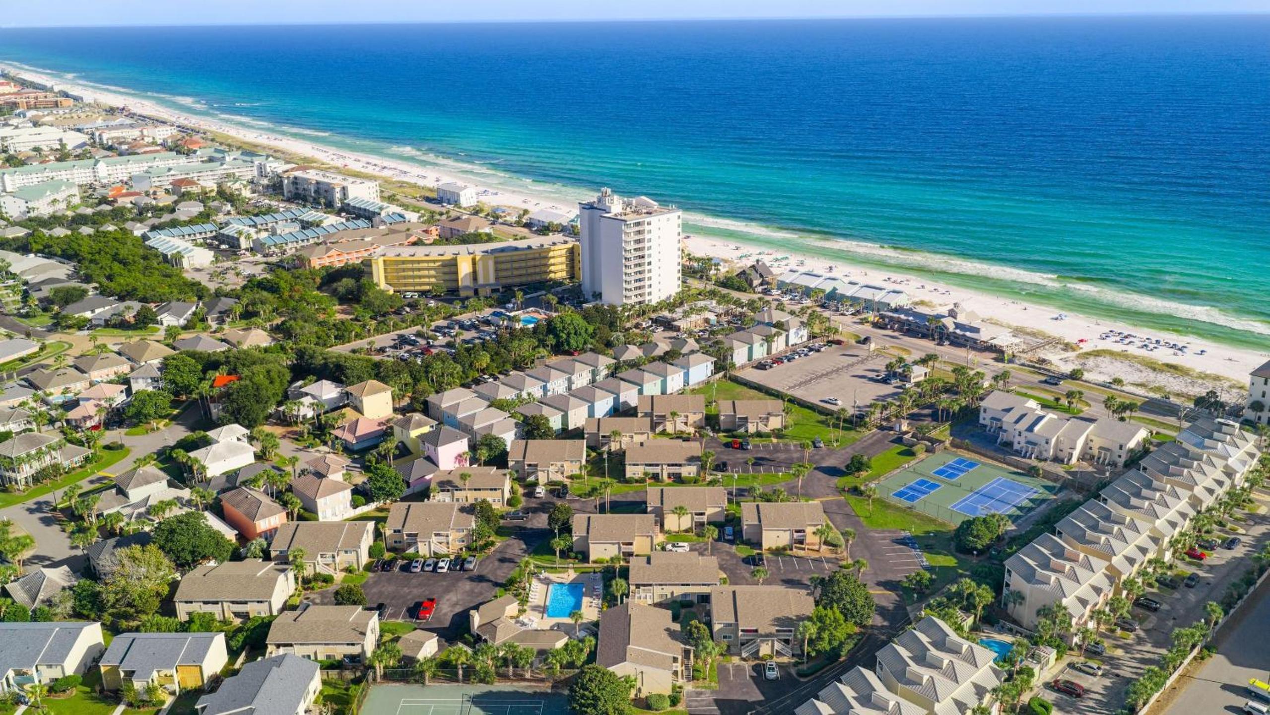 Steps from the Sand Bright Coastal Stay w Pool Access Coastal Hideaway by AvantStay
