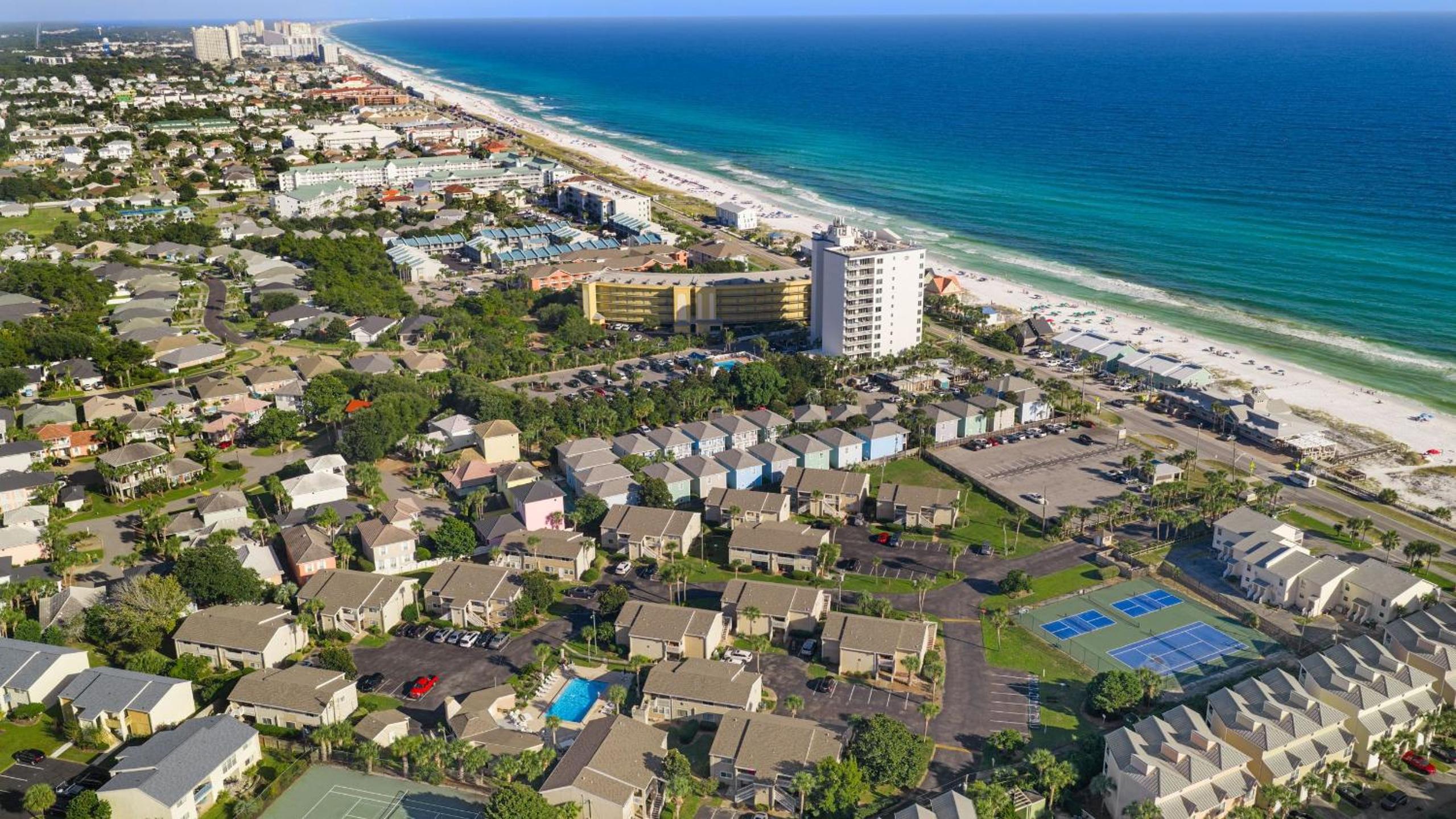 Steps from the Sand Bright Coastal Stay w Pool Access Coastal Hideaway by AvantStay