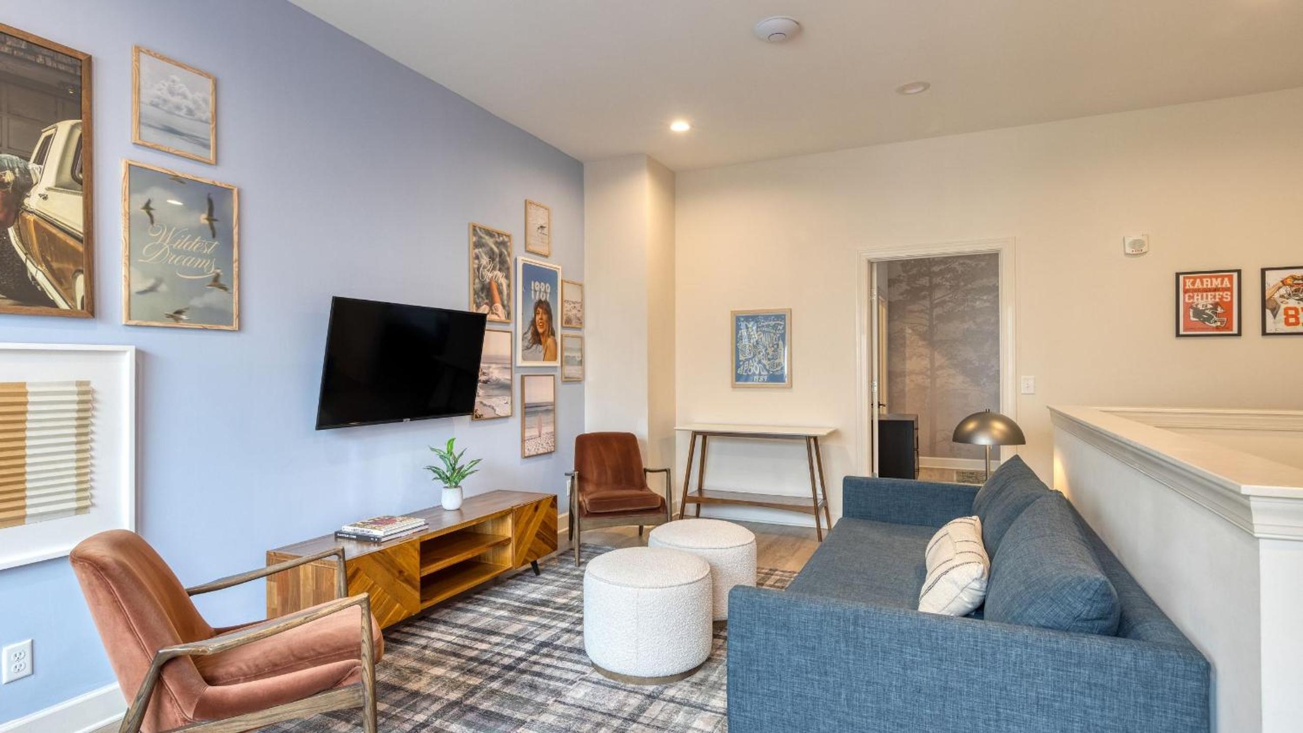 Sleeps 44 4 themed lofts w skyline balconies neon backdrops glam kitchens—perfect for Nashville group stays The Swift Retreat by AvantStay