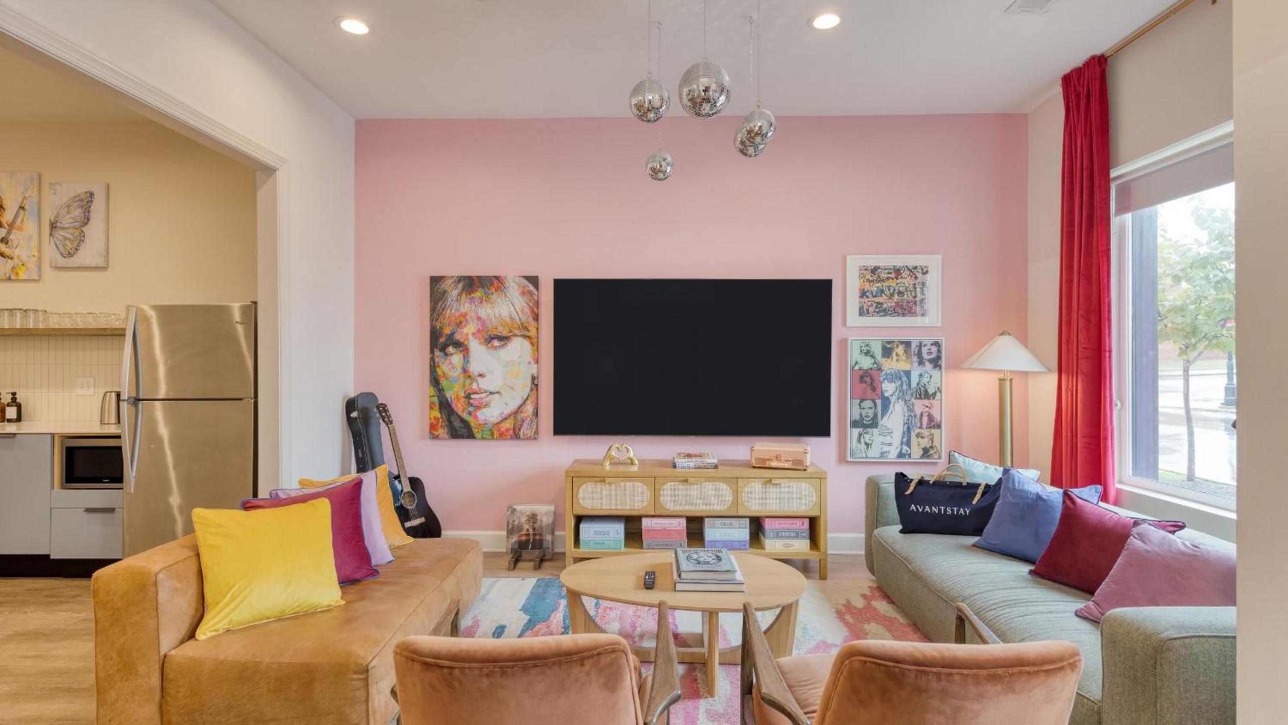 Sleeps 44 4 themed lofts w skyline balconies neon backdrops glam kitchens—perfect for Nashville group stays The Swift Retreat by AvantStay
