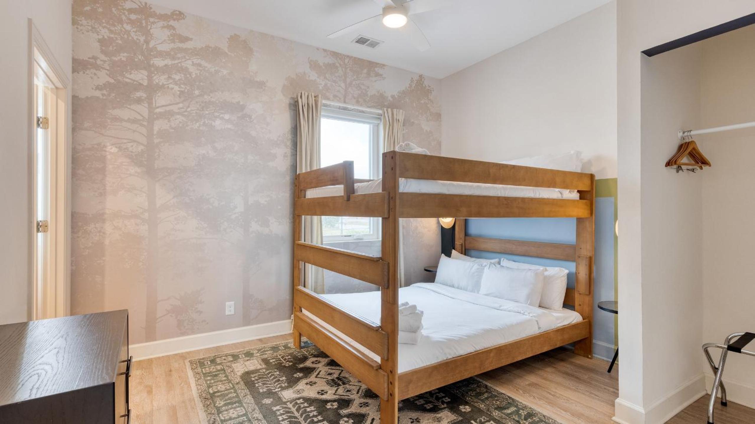 Sleeps 44 4 themed lofts w skyline balconies neon backdrops glam kitchens—perfect for Nashville group stays The Swift Retreat by AvantStay