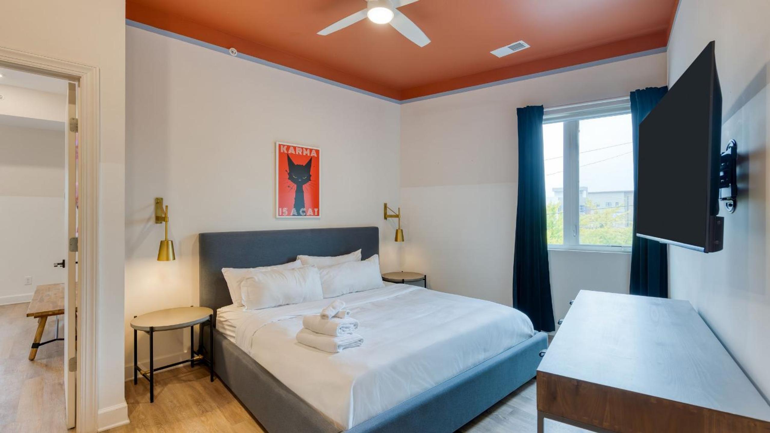 Sleeps 44 4 themed lofts w skyline balconies neon backdrops glam kitchens—perfect for Nashville group stays The Swift Retreat by AvantStay