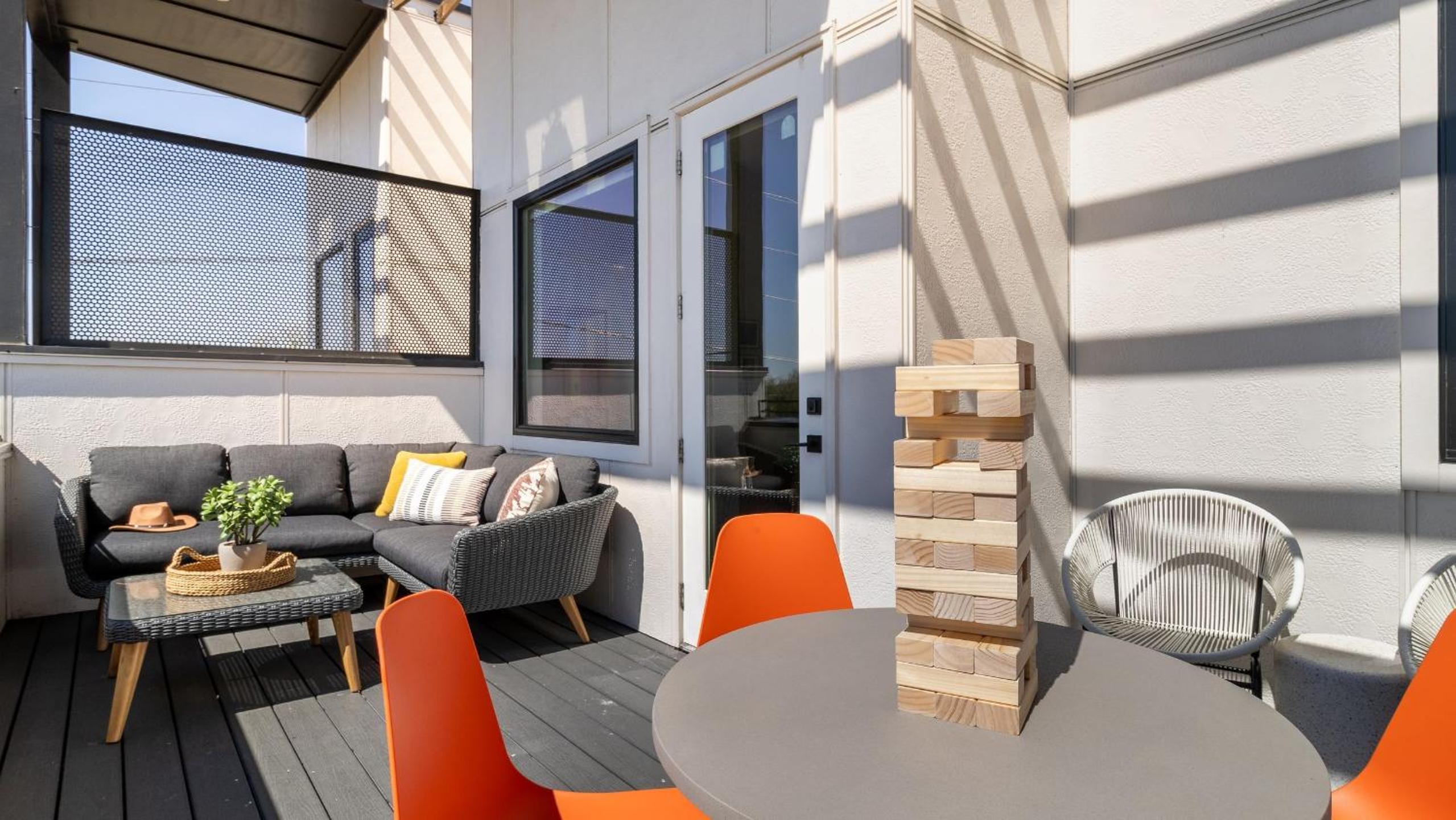 Sleeps 44 4 themed lofts w skyline balconies neon backdrops glam kitchens—perfect for Nashville group stays The Swift Retreat by AvantStay