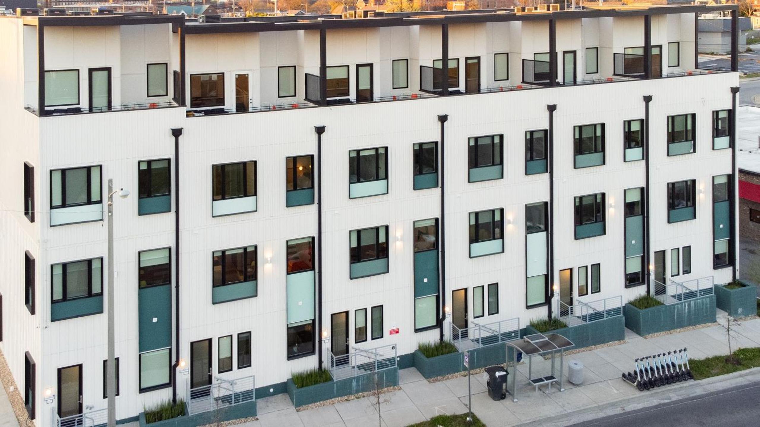 Sleeps 44 4 themed lofts w skyline balconies neon backdrops glam kitchens—perfect for Nashville group stays The Swift Retreat by AvantStay