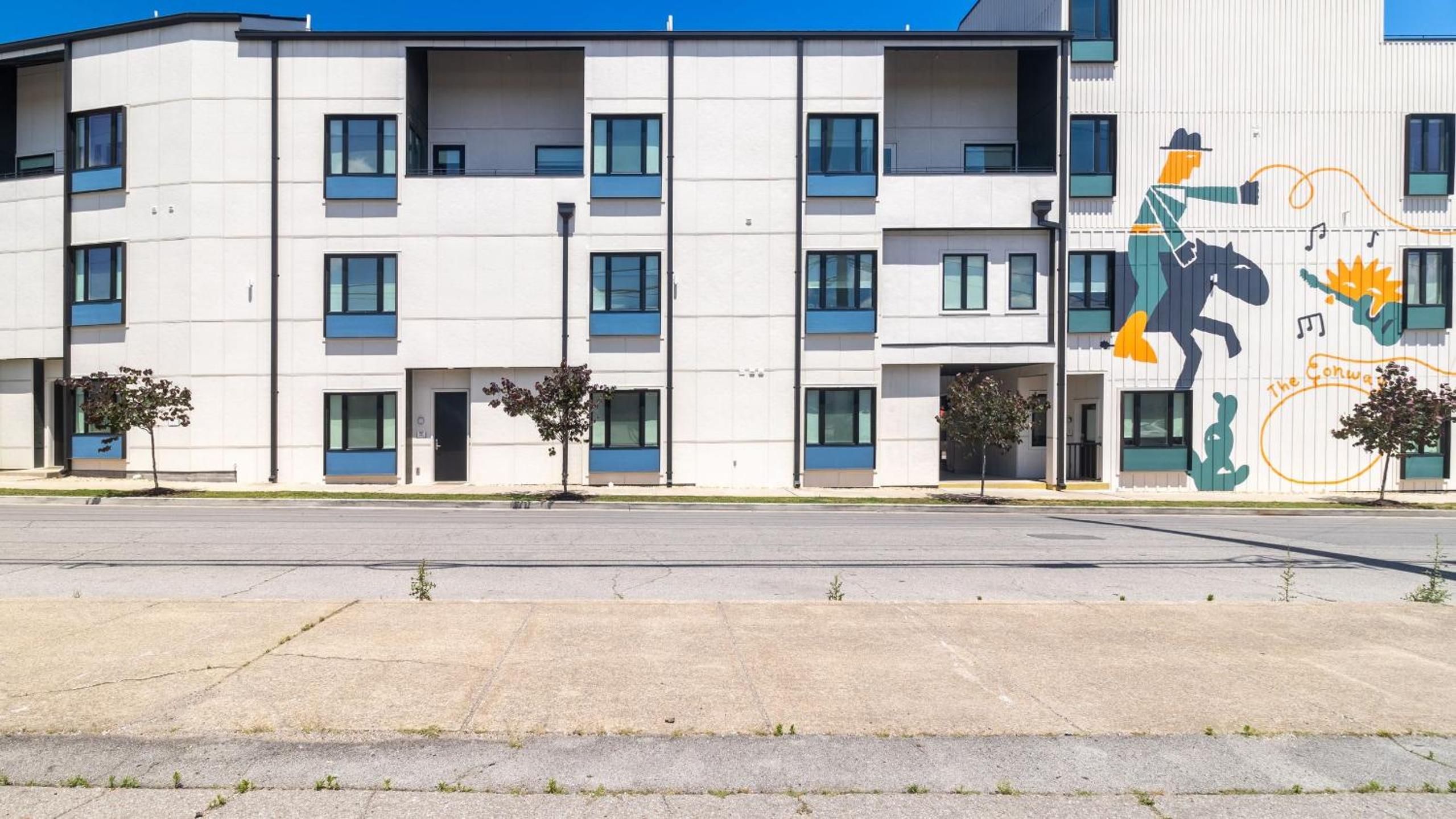 Sleeps 44 4 themed lofts w skyline balconies neon backdrops glam kitchens—perfect for Nashville group stays The Swift Retreat by AvantStay
