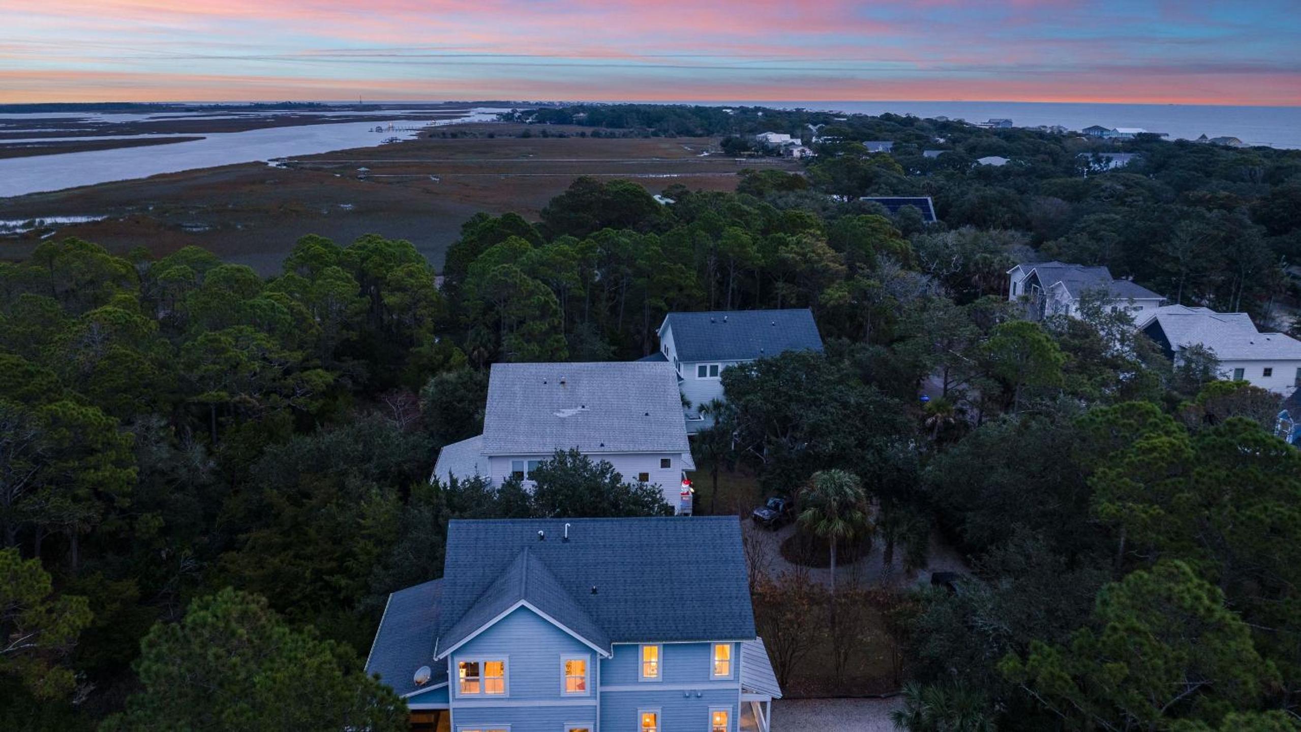 Folly Beach Getaway Near Sand Covered Lounge BBQ Outdoor TV Tidecrest by AvantStay