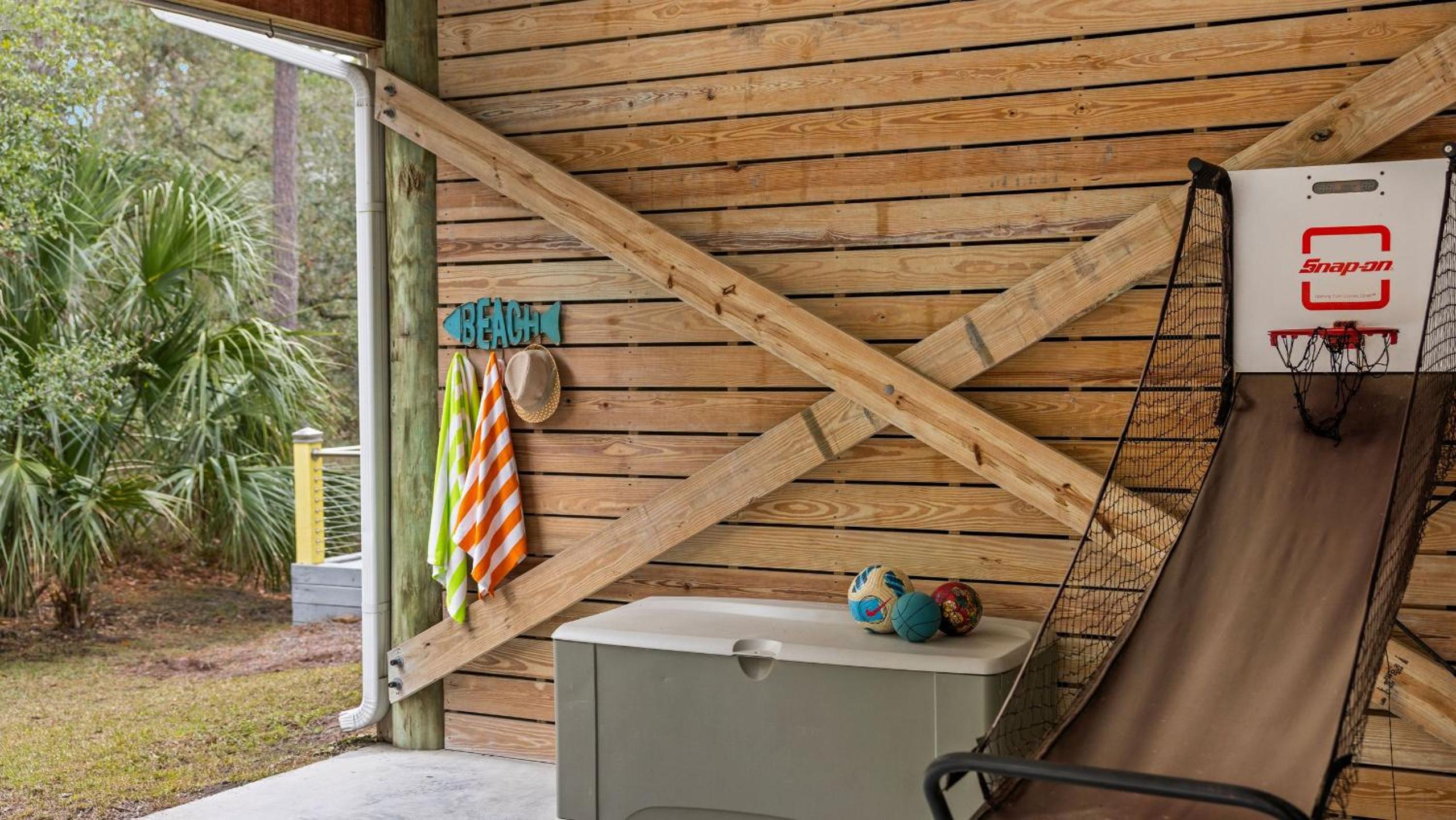 Folly Beach Getaway Near Sand Covered Lounge BBQ Outdoor TV Tidecrest by AvantStay