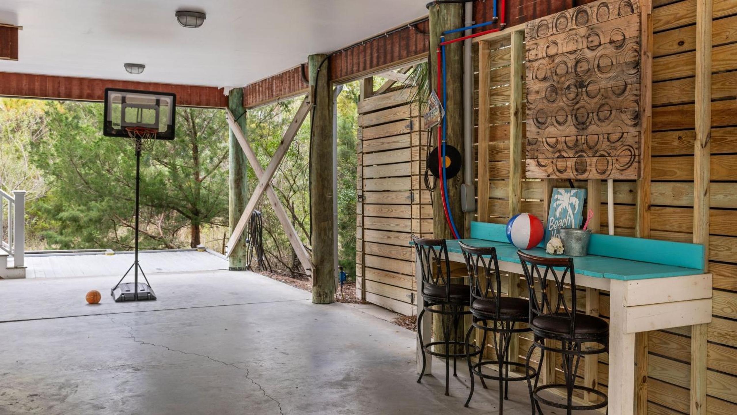 Folly Beach Getaway Near Sand Covered Lounge BBQ Outdoor TV Tidecrest by AvantStay