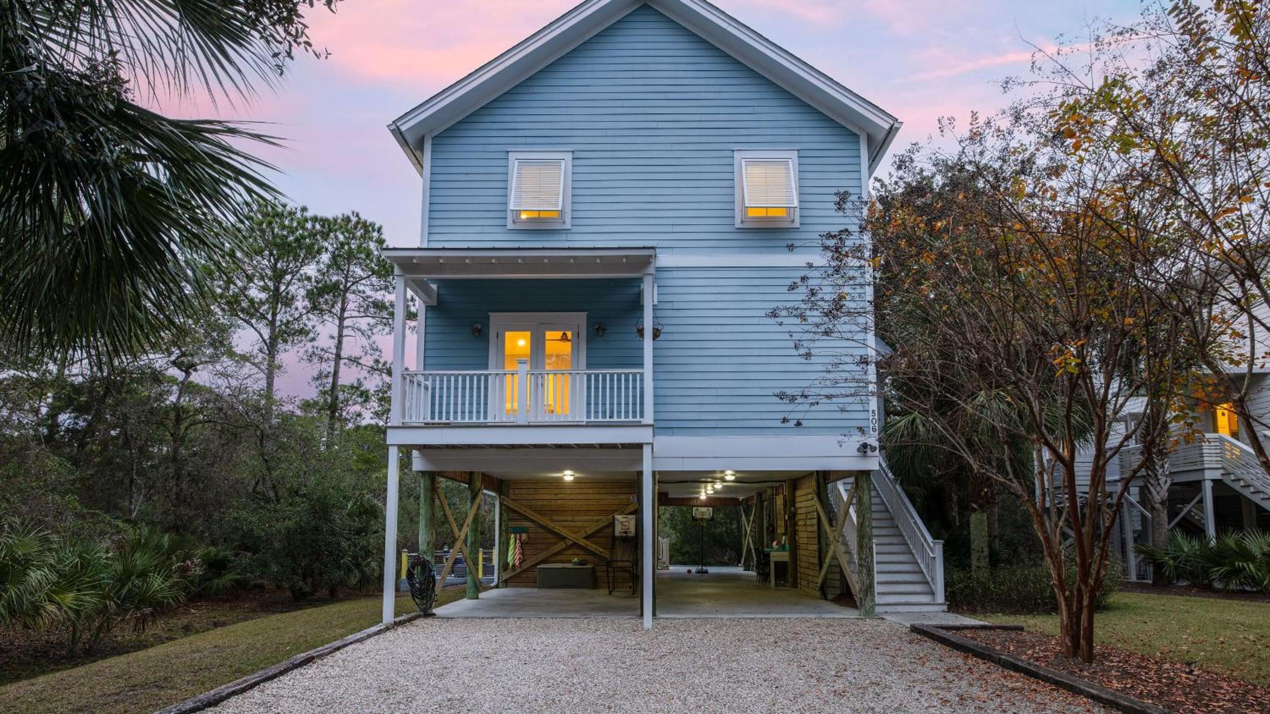 Folly Beach Getaway Near Sand Covered Lounge BBQ Outdoor TV Tidecrest by AvantStay