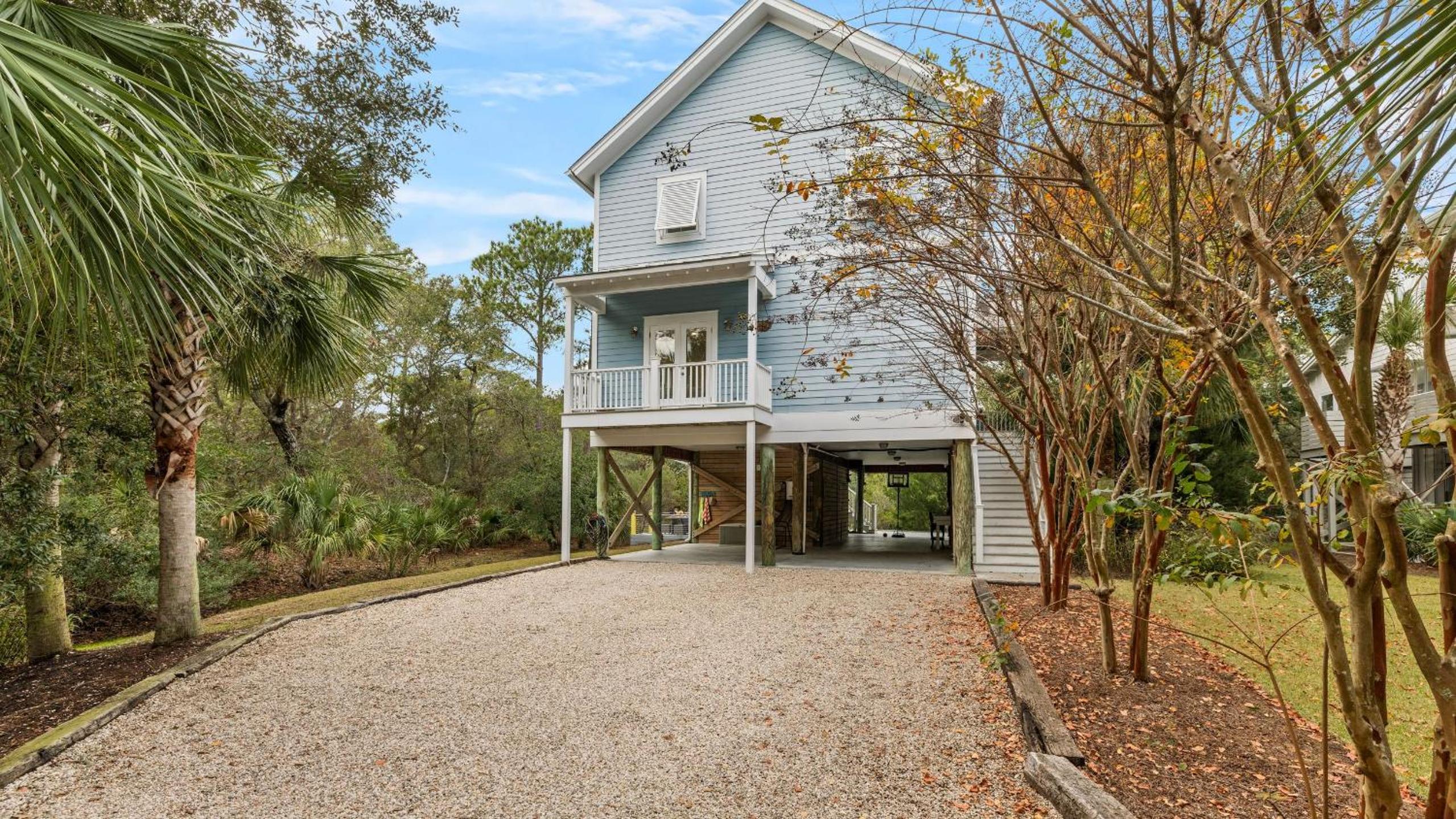 Folly Beach Getaway Near Sand Covered Lounge BBQ Outdoor TV Tidecrest by AvantStay