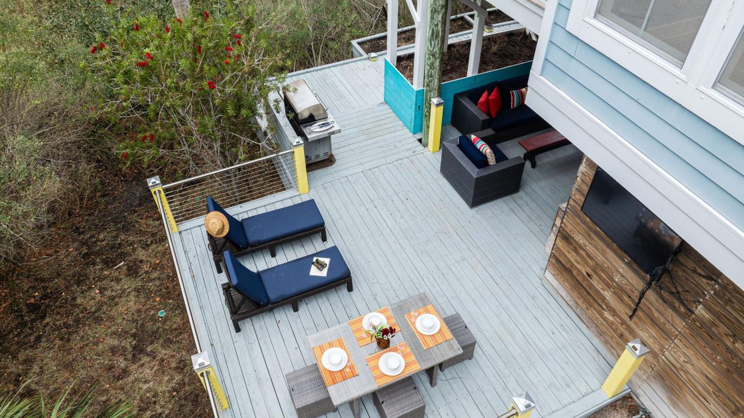 Folly Beach Getaway Near Sand Covered Lounge BBQ Outdoor TV Tidecrest by AvantStay