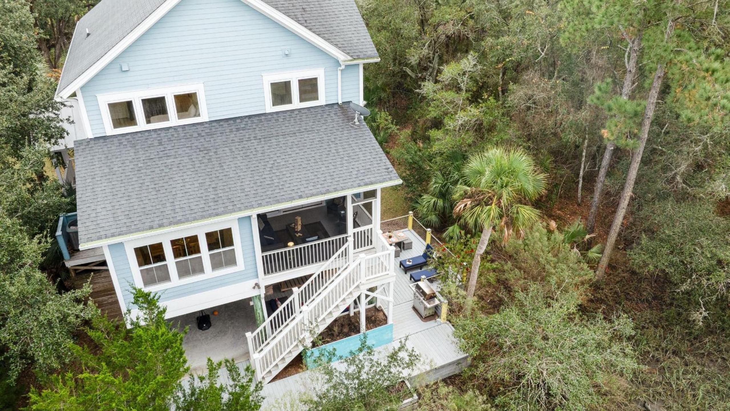 Folly Beach Getaway Near Sand Covered Lounge BBQ Outdoor TV Tidecrest by AvantStay