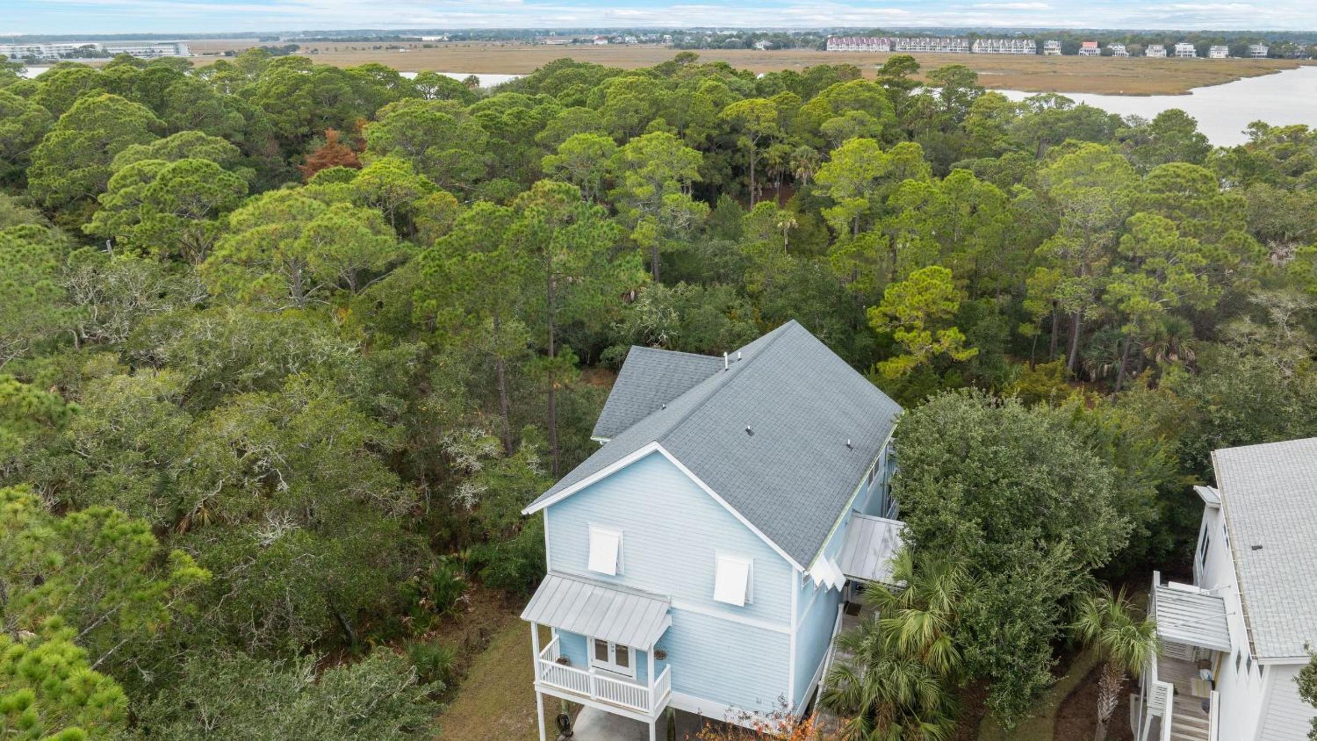 Folly Beach Getaway Near Sand Covered Lounge BBQ Outdoor TV Tidecrest by AvantStay