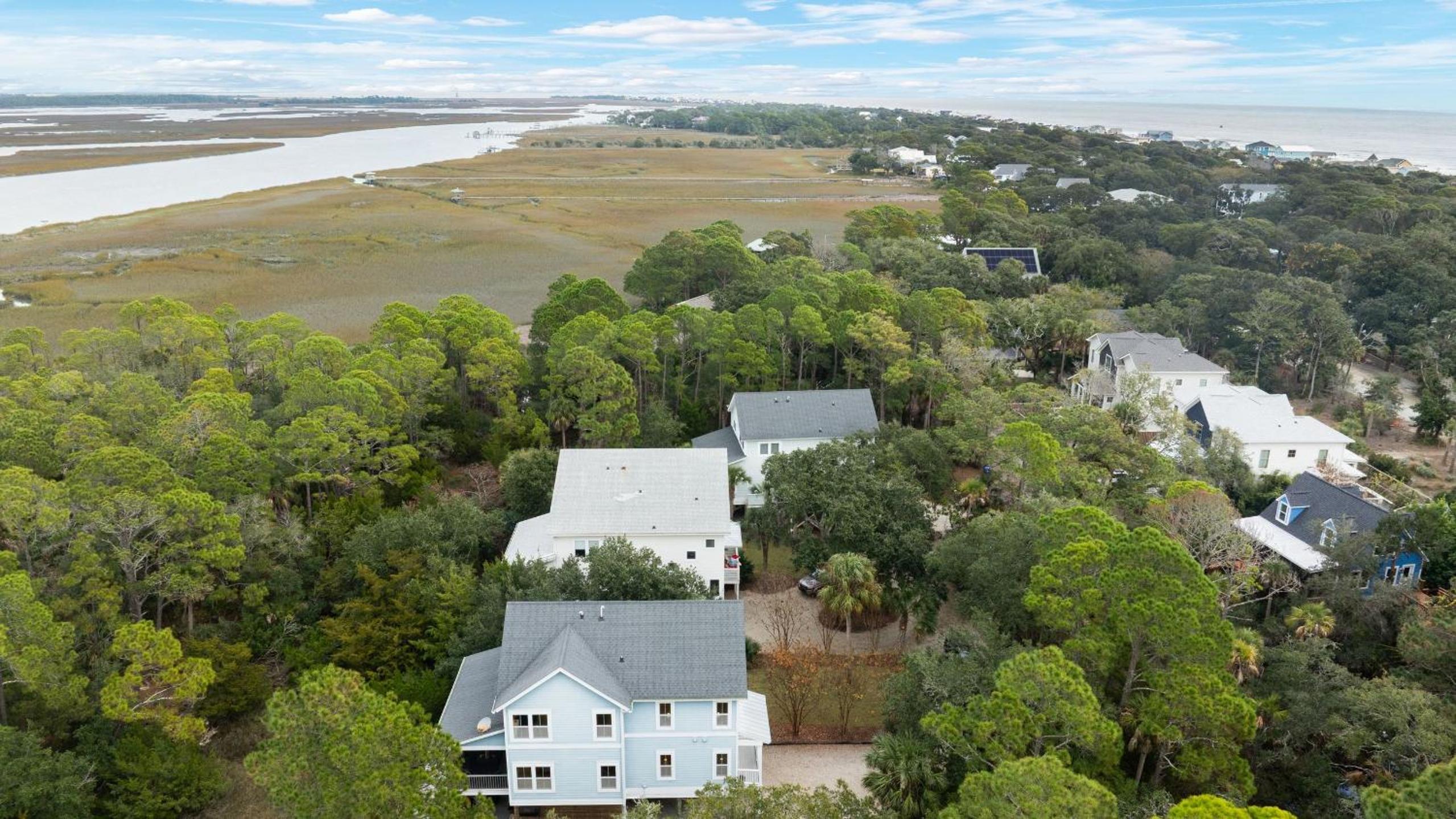 Folly Beach Getaway Near Sand Covered Lounge BBQ Outdoor TV Tidecrest by AvantStay