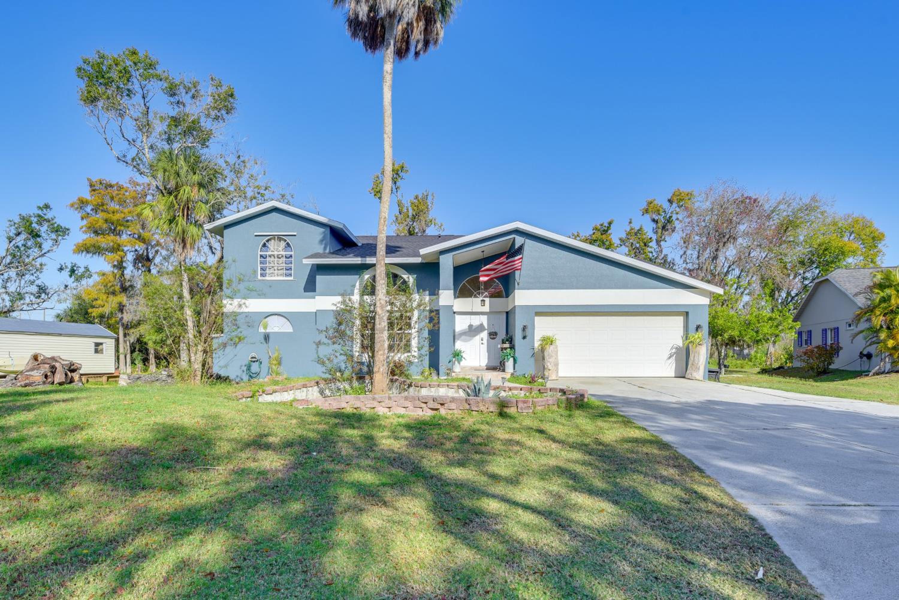 Outdoor Kitchen and Gaming Garage Bradenton Retreat