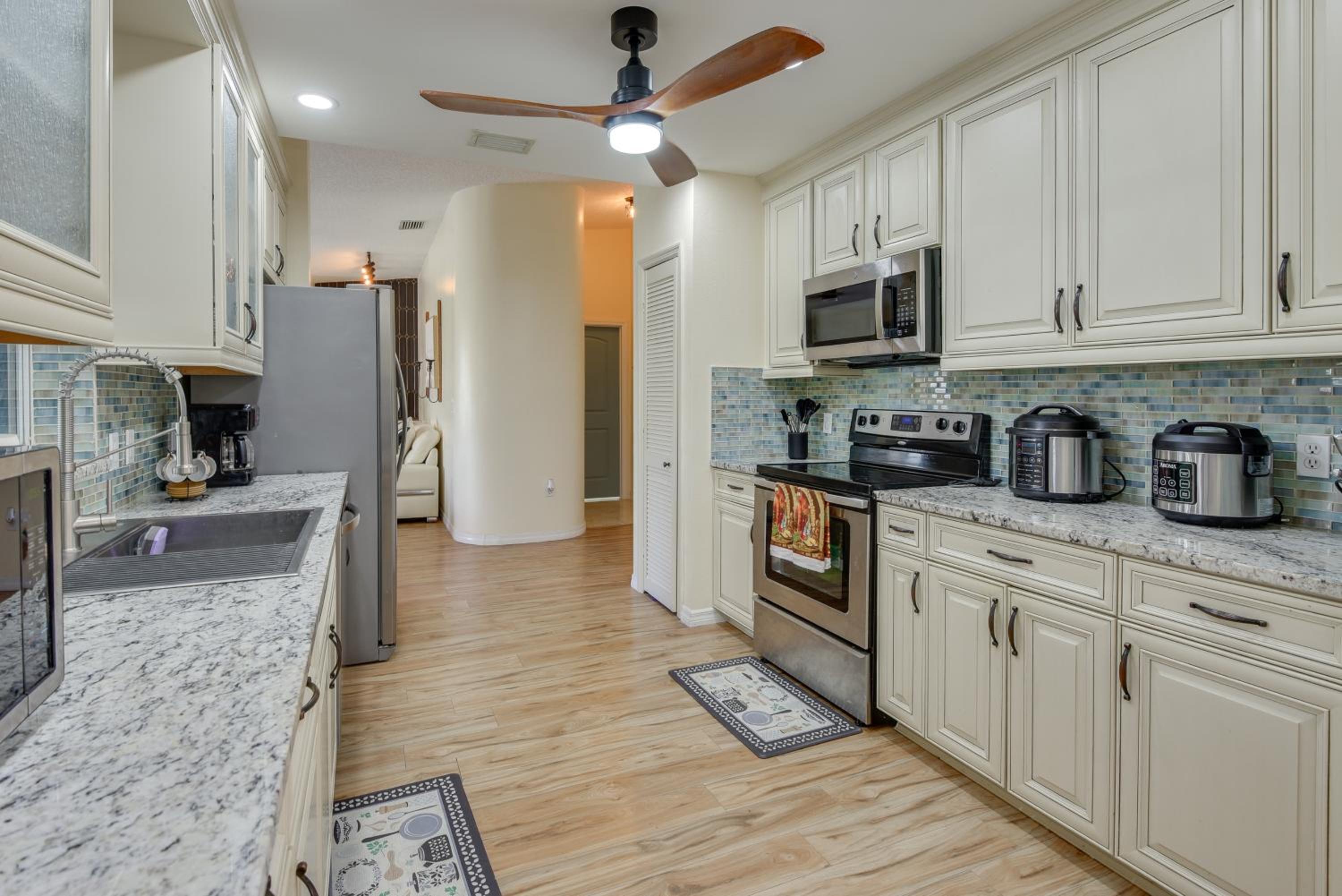 Outdoor Kitchen and Gaming Garage Bradenton Retreat