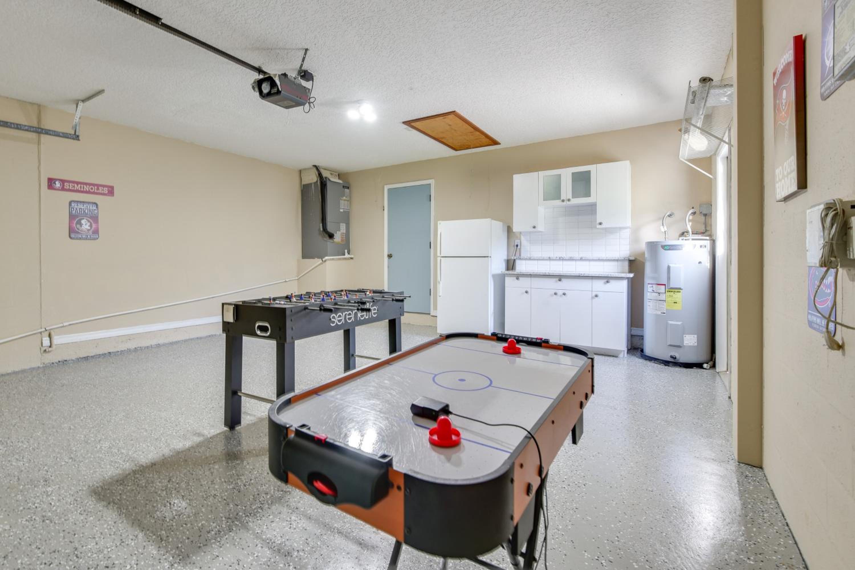 Outdoor Kitchen and Gaming Garage Bradenton Retreat