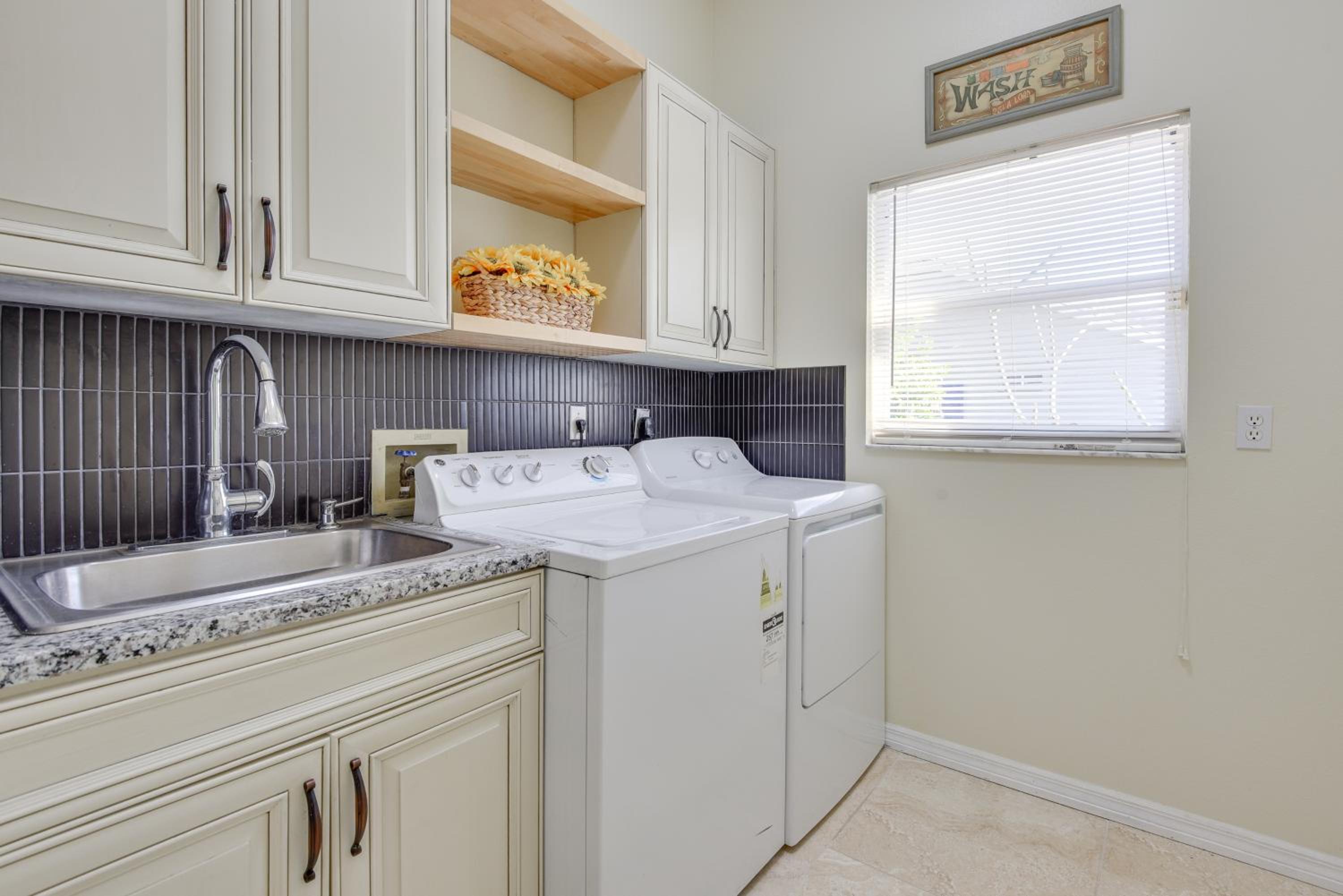 Outdoor Kitchen and Gaming Garage Bradenton Retreat