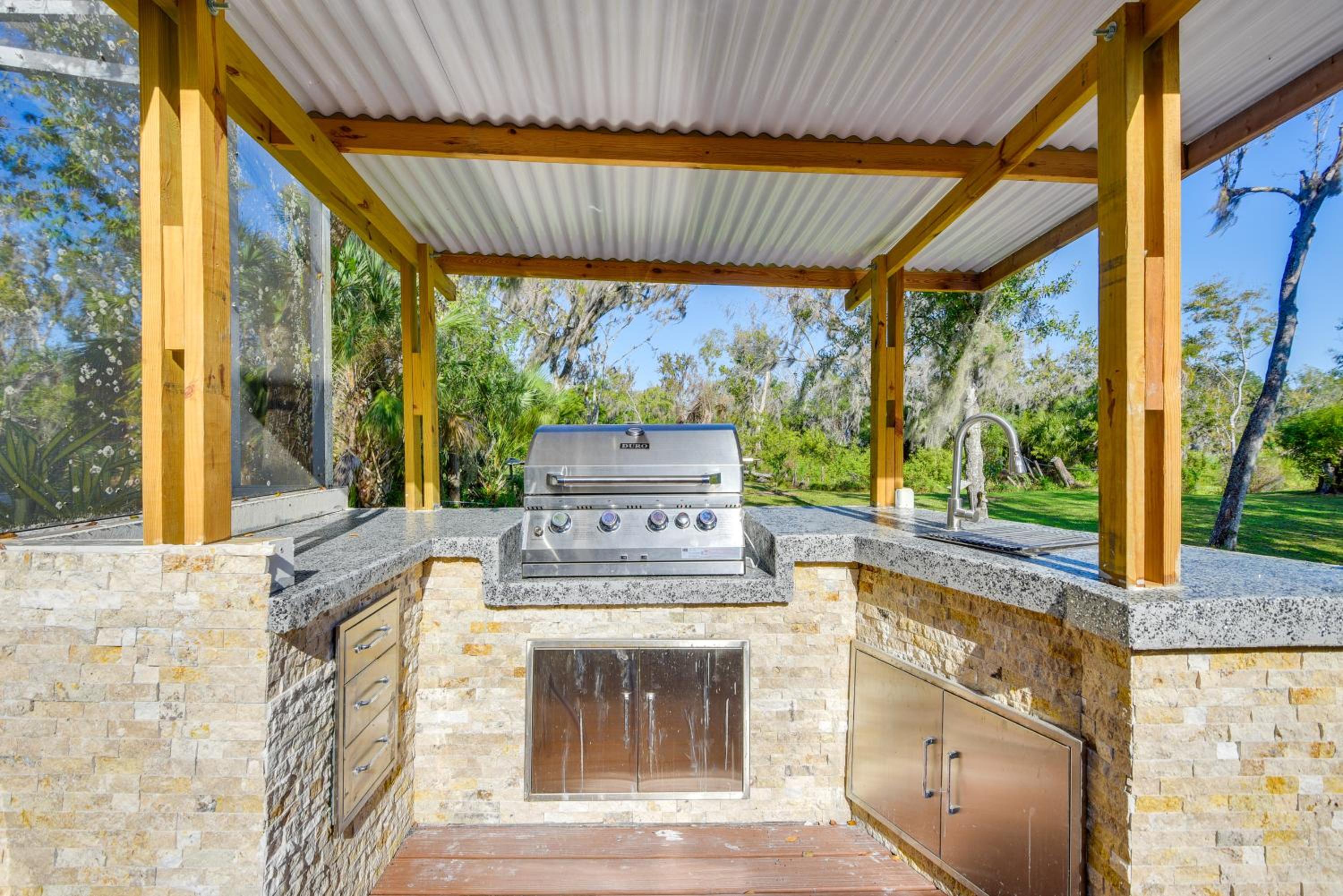 Outdoor Kitchen and Gaming Garage Bradenton Retreat