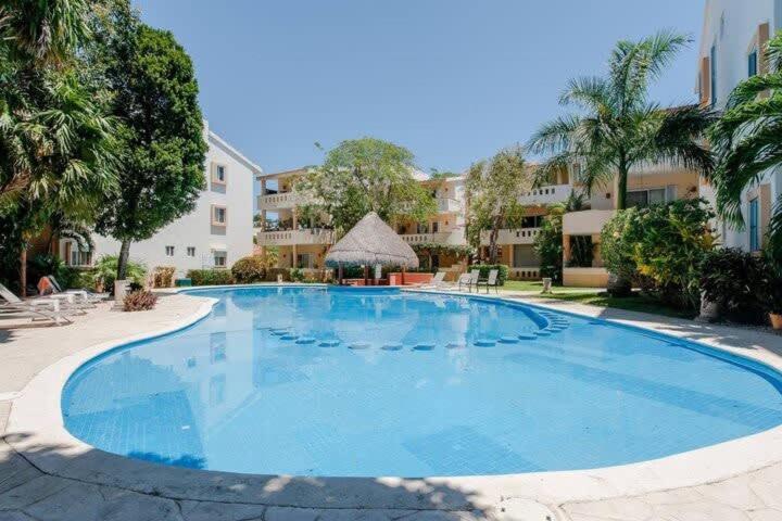 Private balcony I Gated Playacar I Pool On Site!