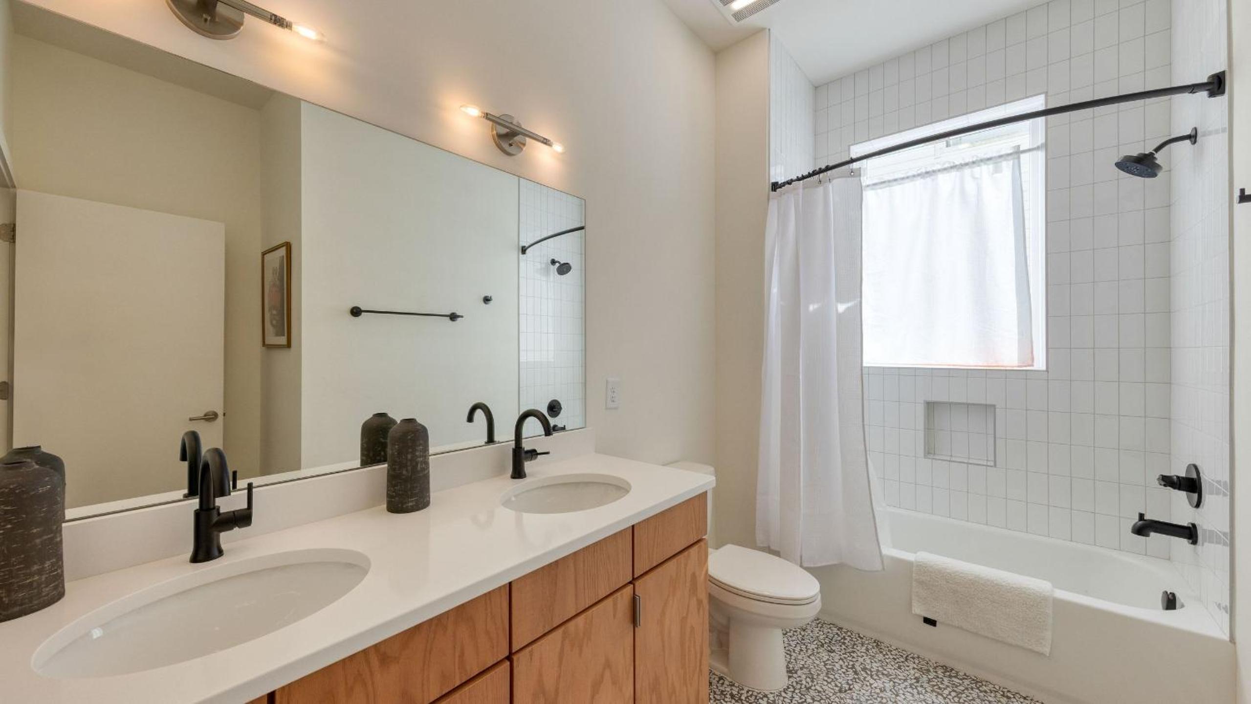 Modern Nashville Getaway Minutes from Downtown Five Points Hearth and Hideout by AvantStay
