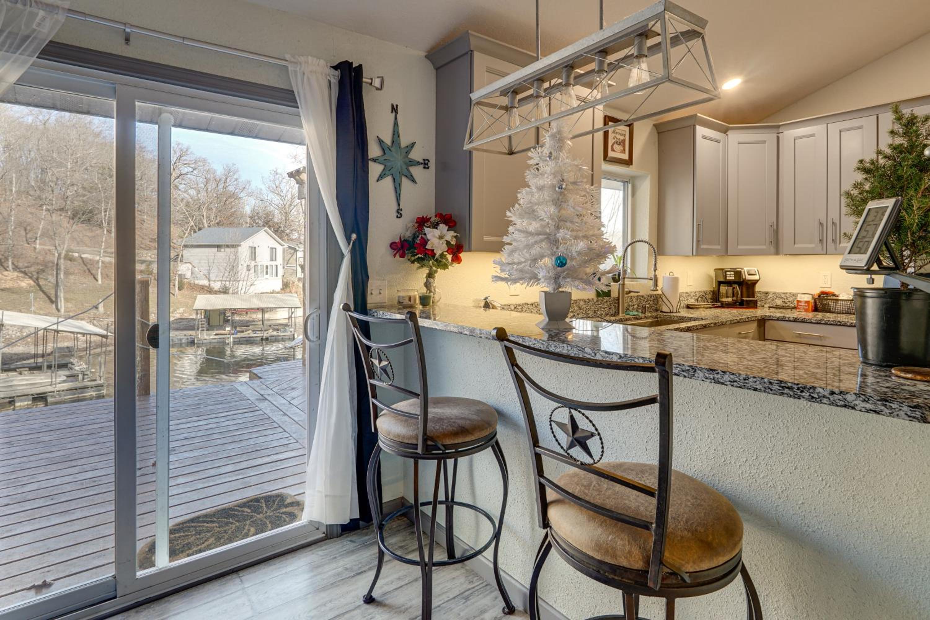 Lake Ozarks Home with Deck, Dock and Hot Tub