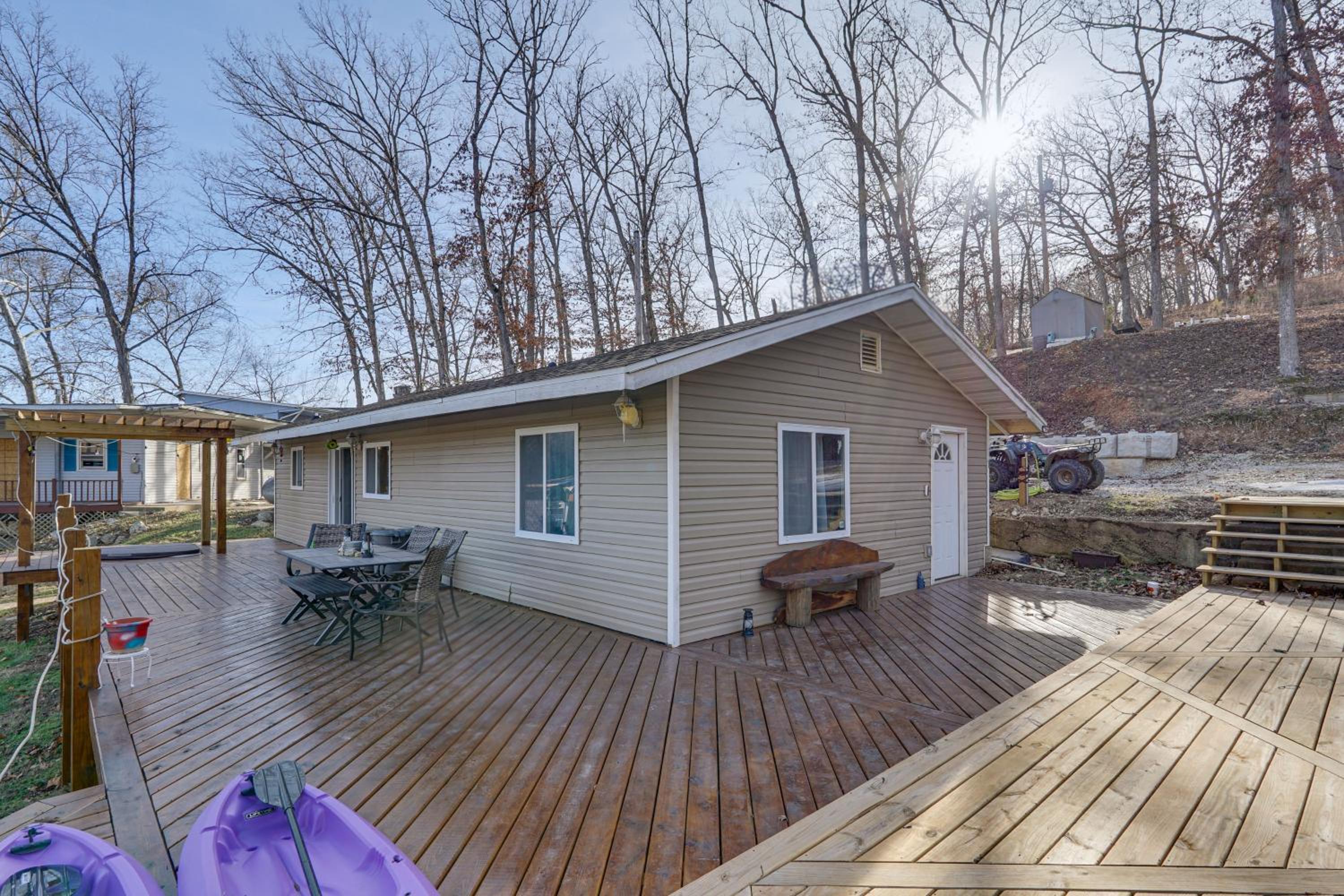 Lake Ozarks Home with Deck, Dock and Hot Tub