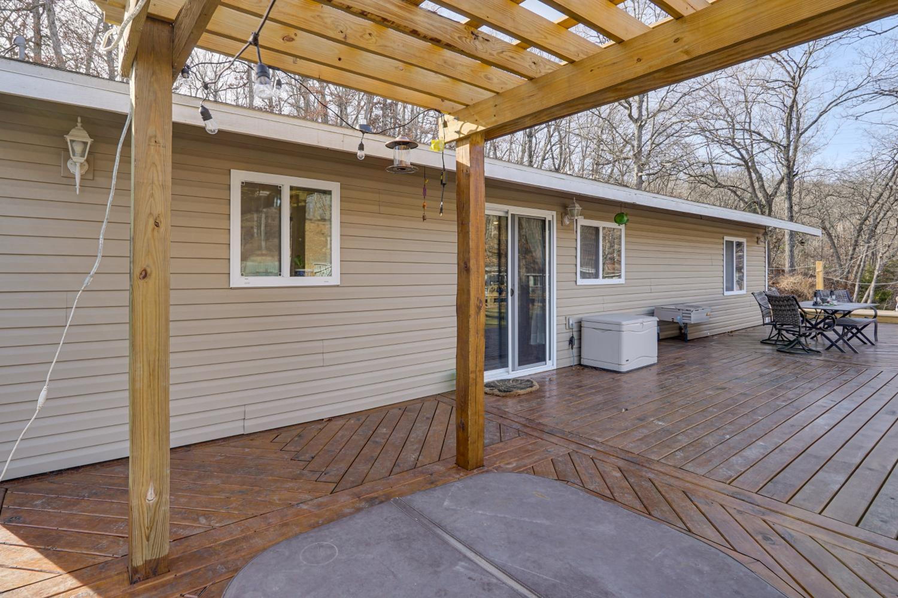 Lake Ozarks Home with Deck, Dock and Hot Tub