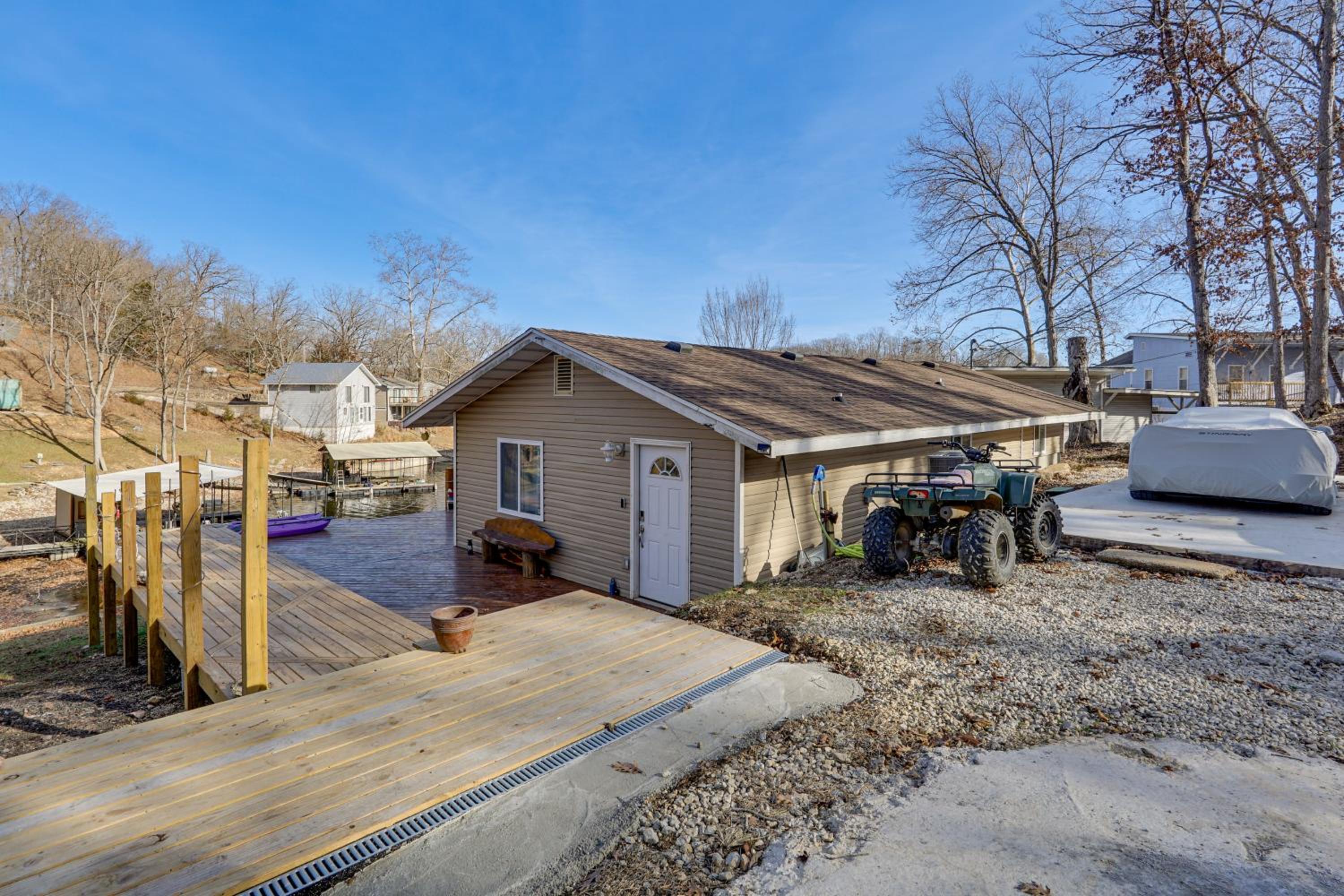 Lake Ozarks Home with Deck, Dock and Hot Tub