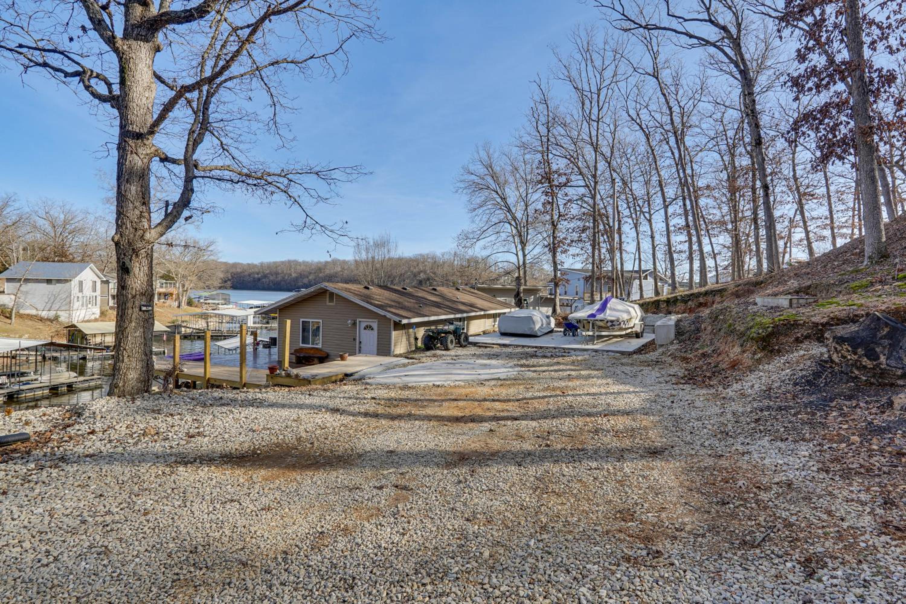 Lake Ozarks Home with Deck, Dock and Hot Tub