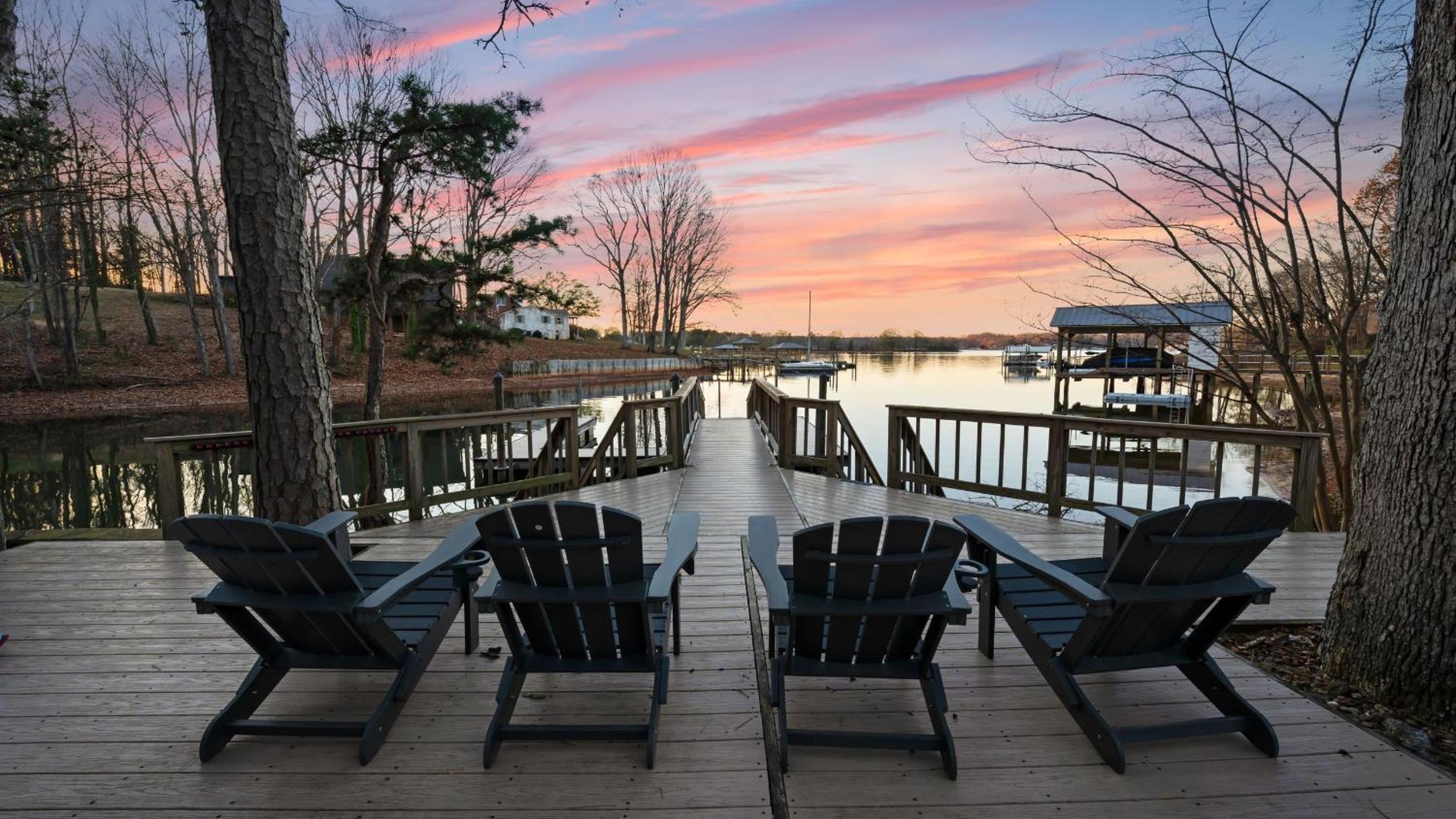 Spacious Lake Norman Home w Tennis Court Firepit Deck Lion Manor by AvantStay