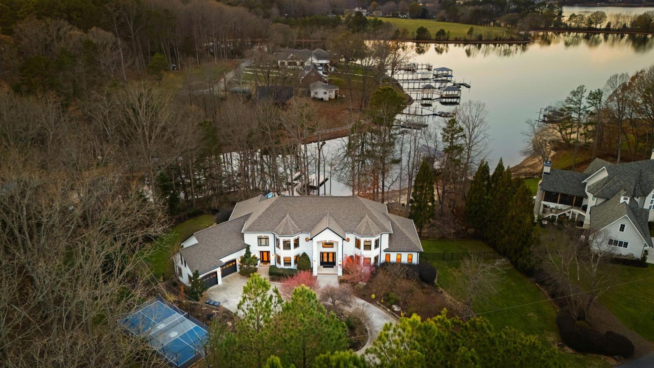 Spacious Lake Norman Home w Tennis Court Firepit Deck Lion Manor by AvantStay