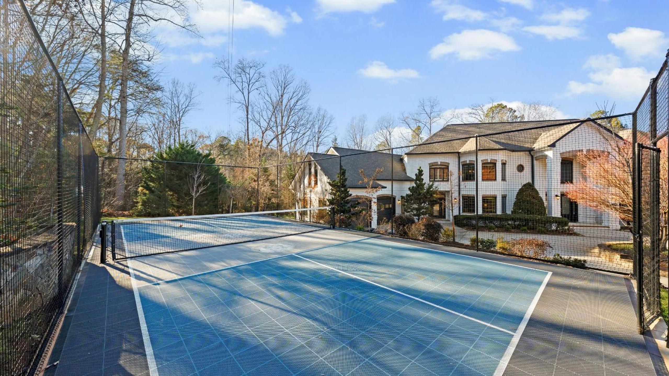 Spacious Lake Norman Home w Tennis Court Firepit Deck Lion Manor by AvantStay