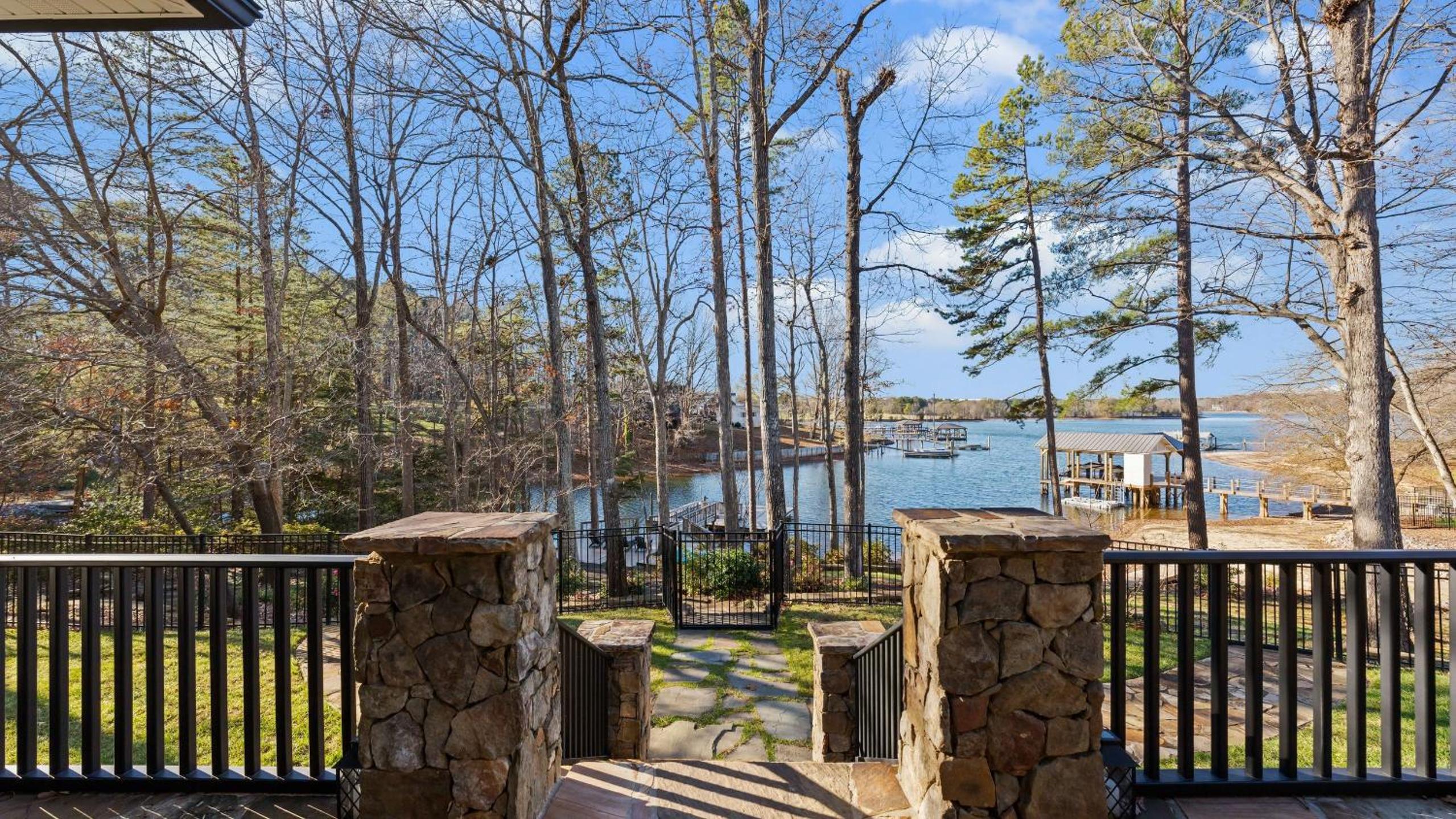 Spacious Lake Norman Home w Tennis Court Firepit Deck Lion Manor by AvantStay