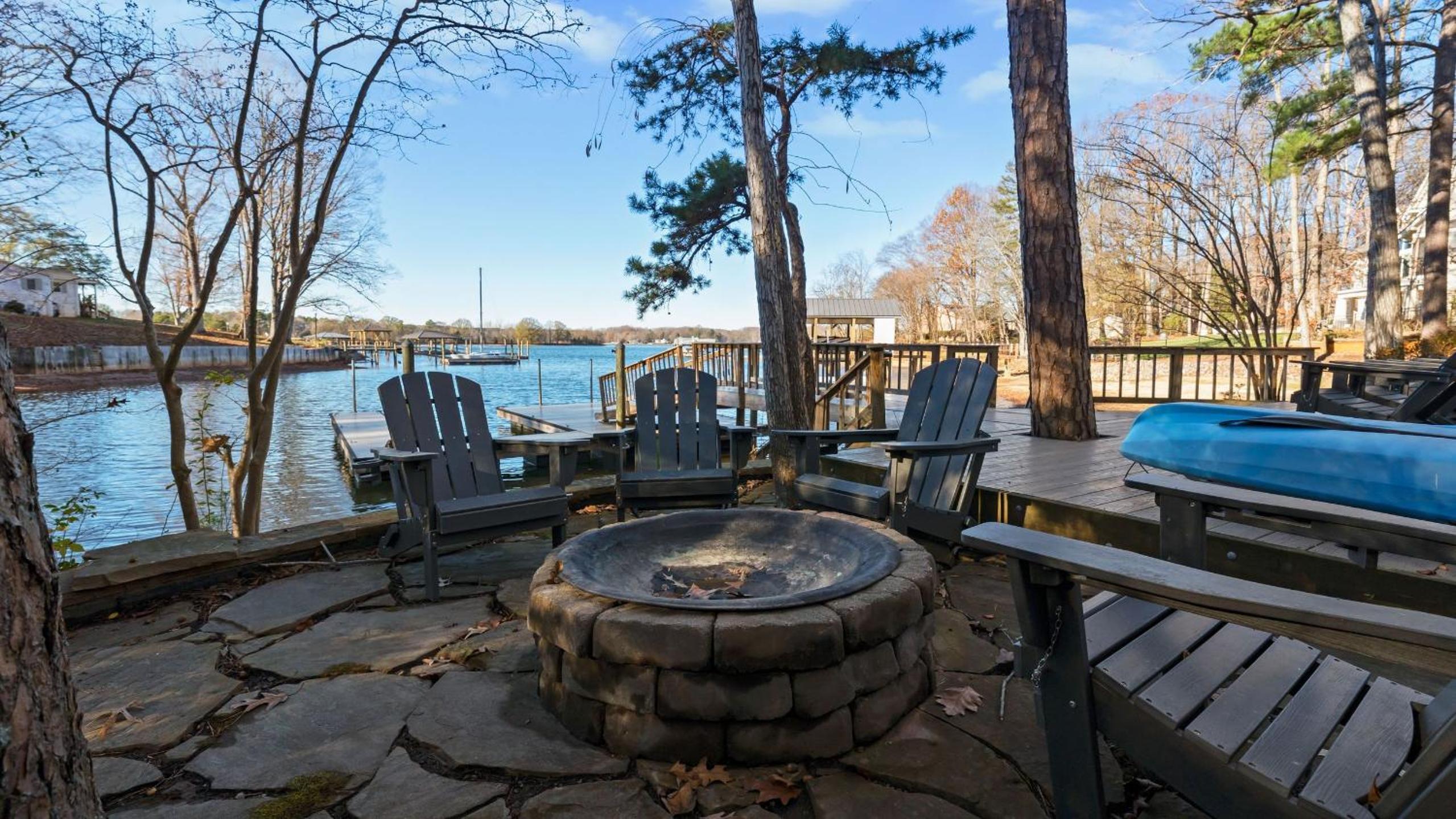 Spacious Lake Norman Home w Tennis Court Firepit Deck Lion Manor by AvantStay
