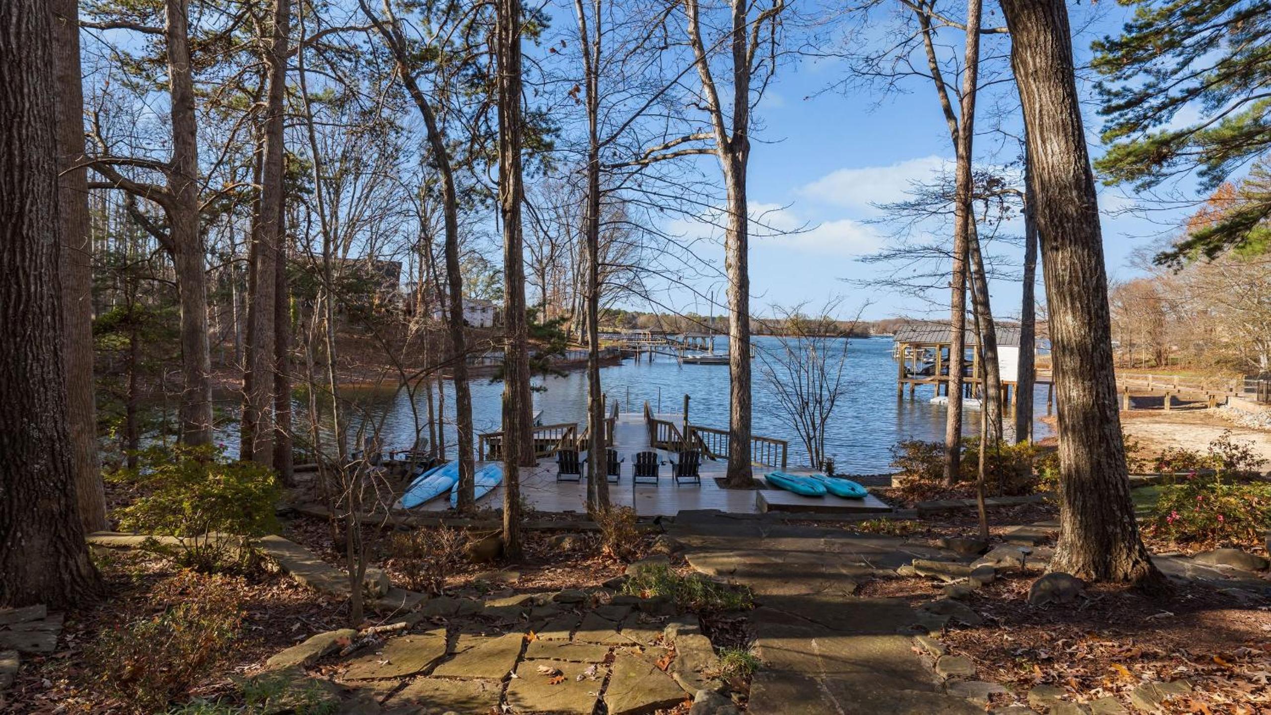 Spacious Lake Norman Home w Tennis Court Firepit Deck Lion Manor by AvantStay