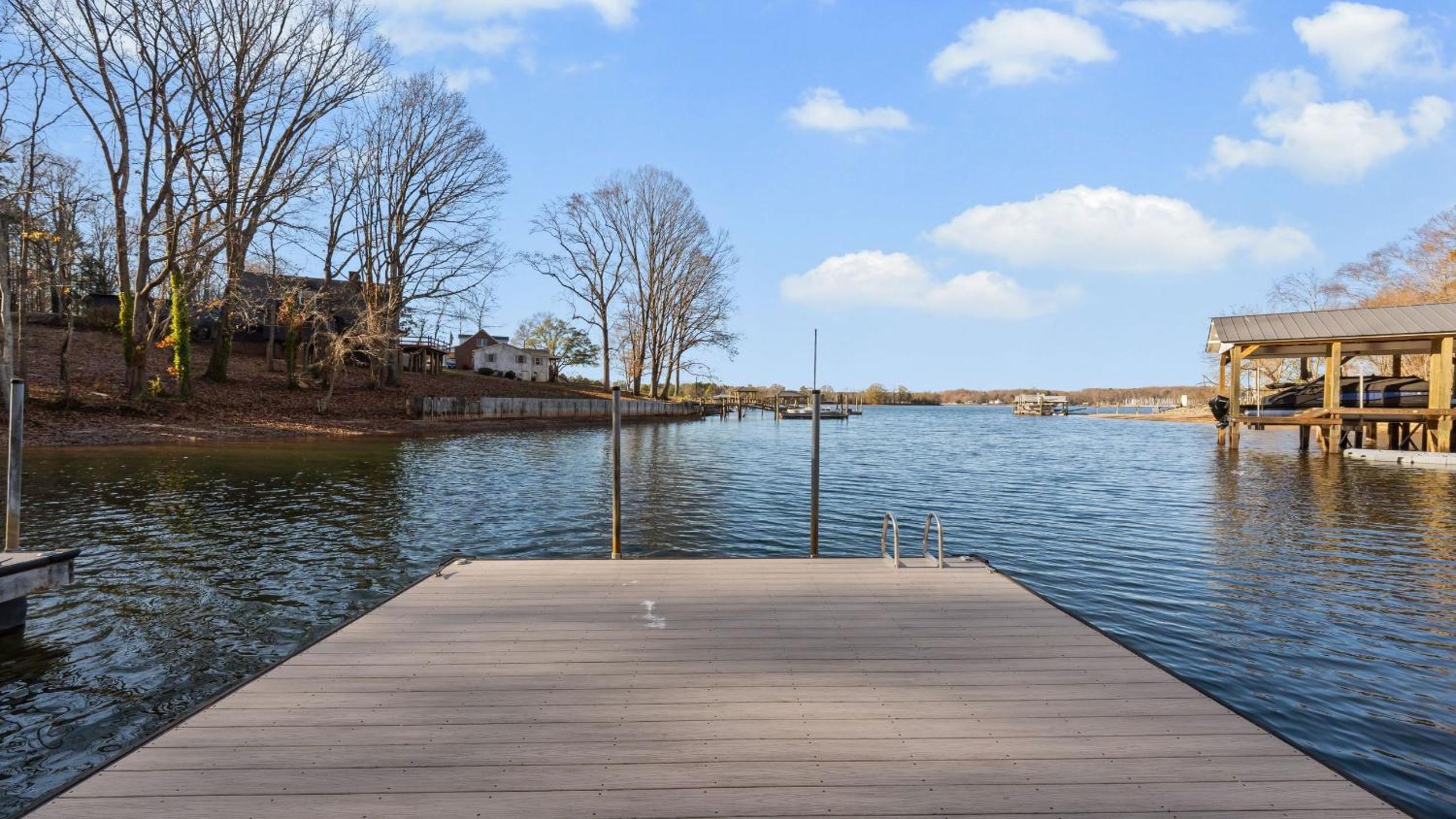 Spacious Lake Norman Home w Tennis Court Firepit Deck Lion Manor by AvantStay