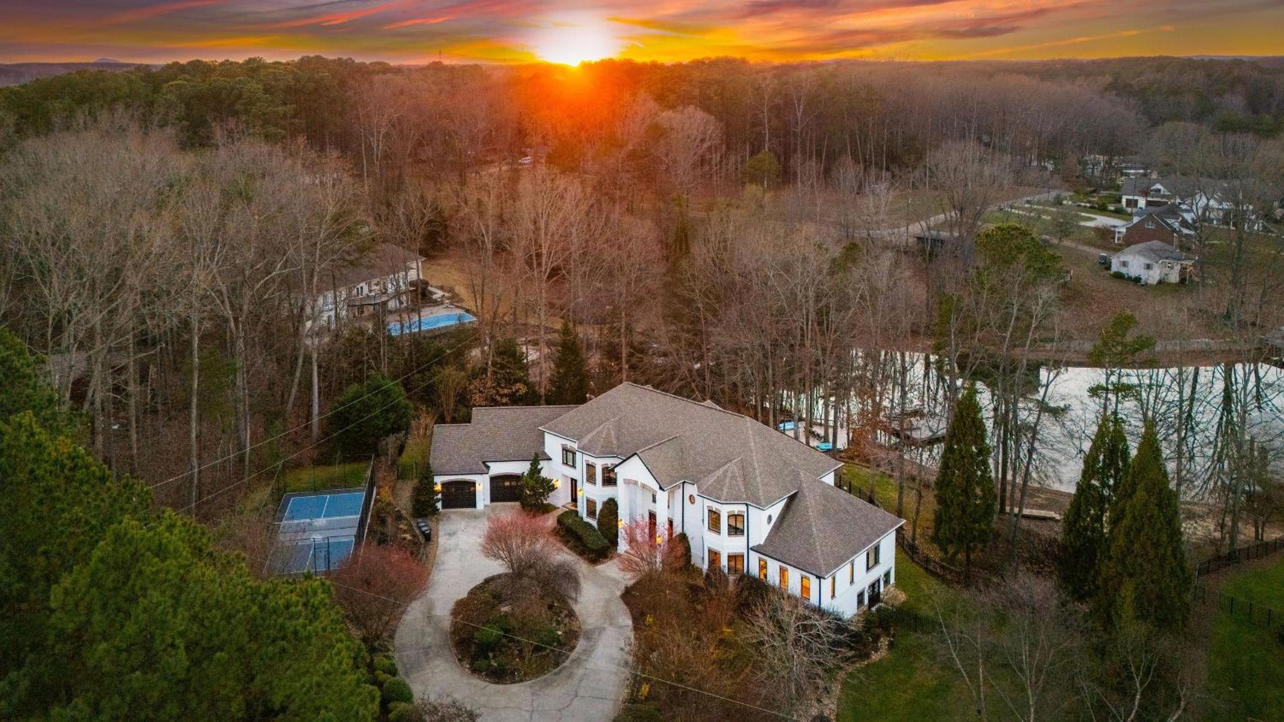 Spacious Lake Norman Home w Tennis Court Firepit Deck Lion Manor by AvantStay