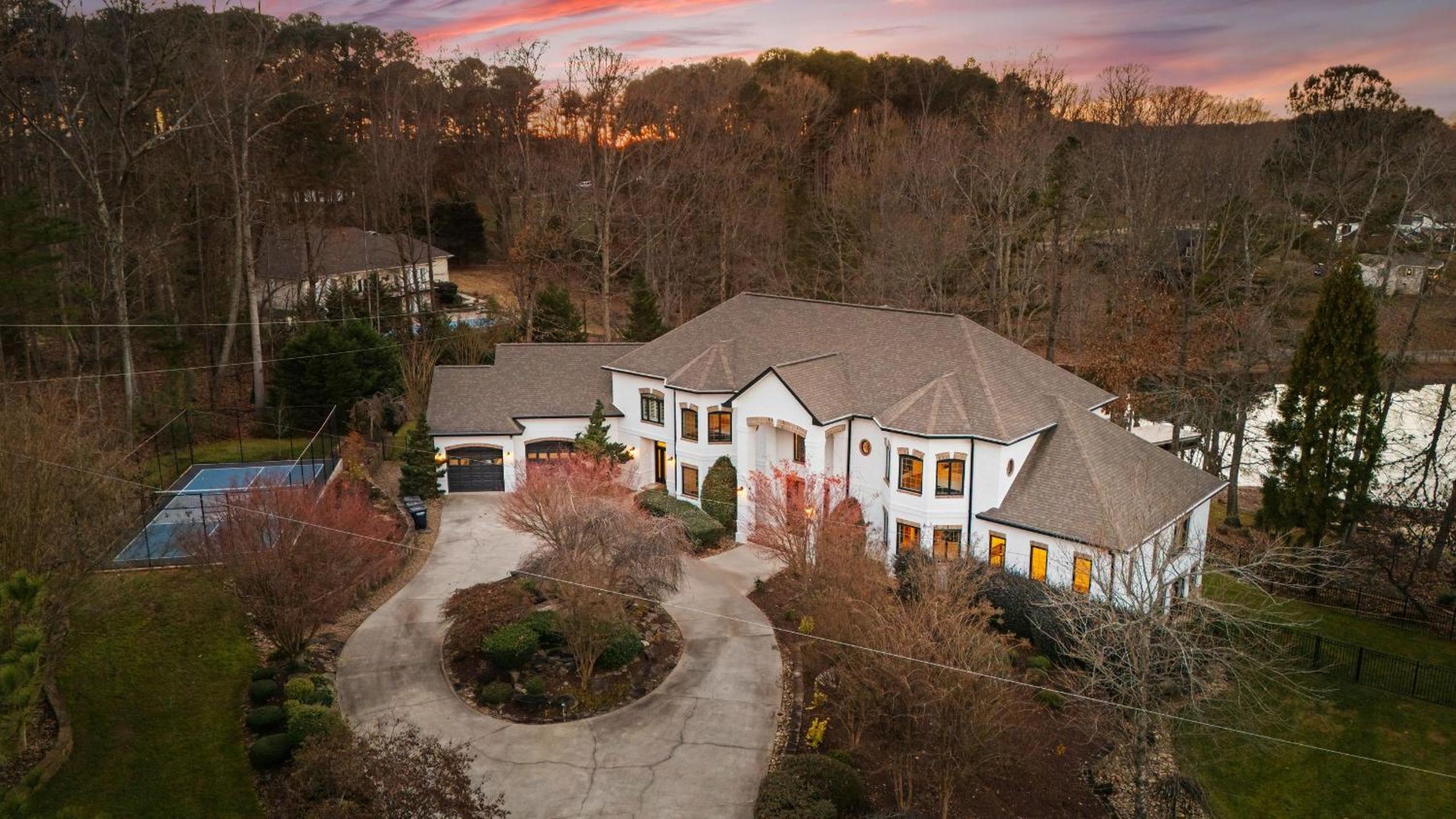 Spacious Lake Norman Home w Tennis Court Firepit Deck Lion Manor by AvantStay