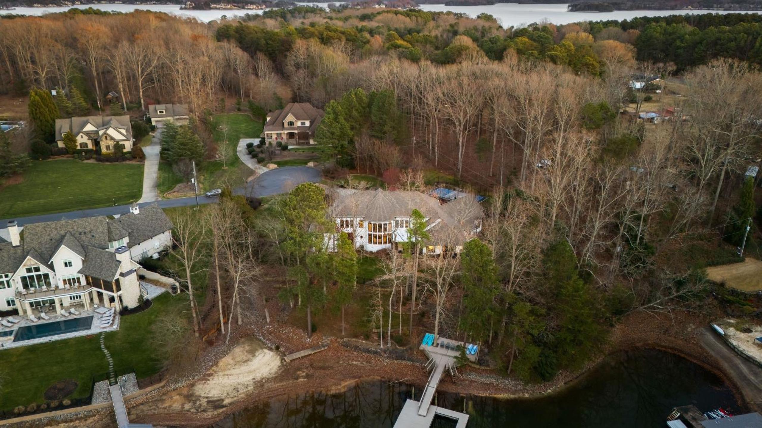 Spacious Lake Norman Home w Tennis Court Firepit Deck Lion Manor by AvantStay