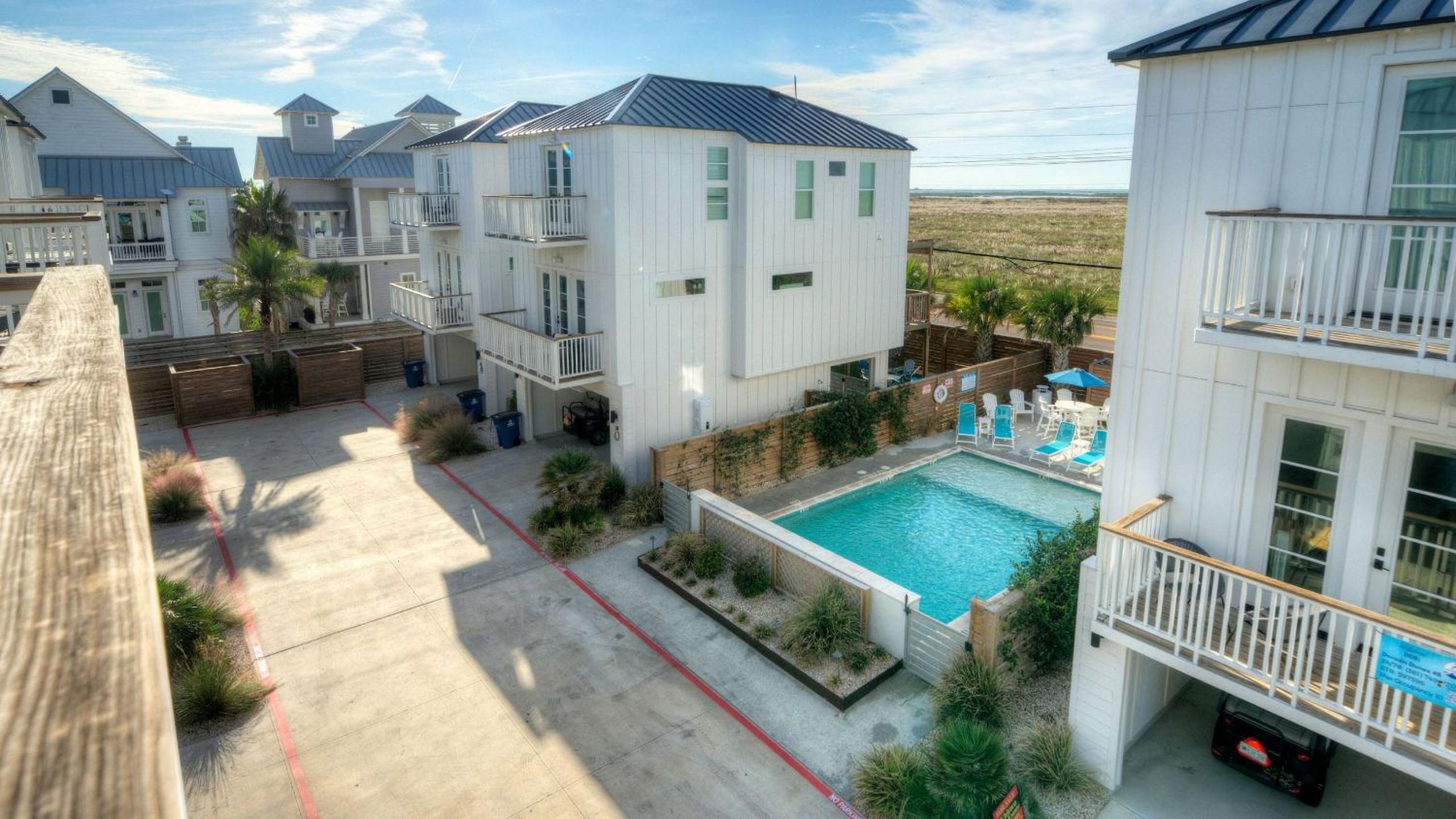 Boardwalk Beach Access Private Pool Balcony Dining Coastal Haven by AvantStay