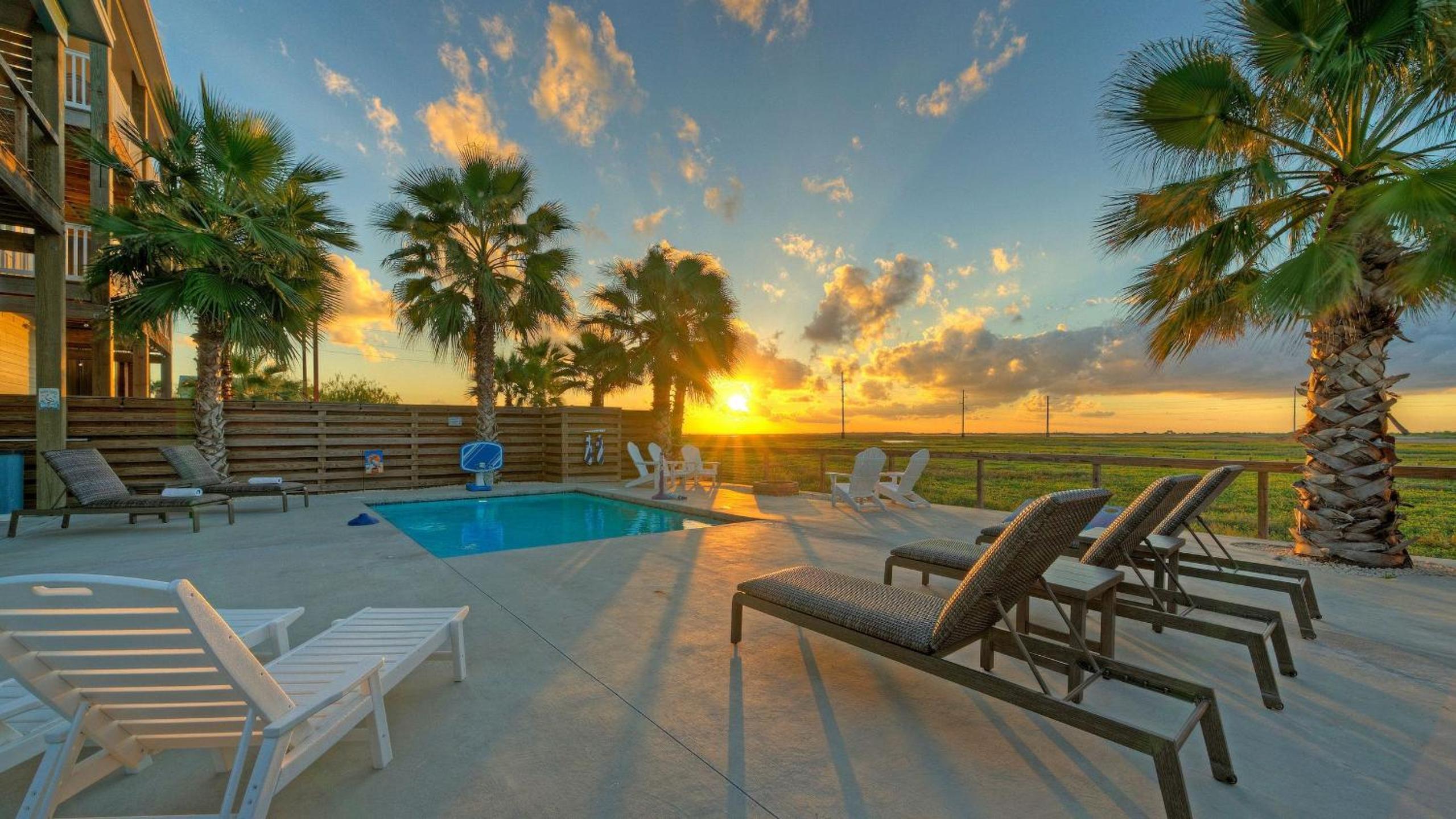 Bayfront Home w Pool Game Room Walk to Beach Golf Cart Access Pelican’s Perch by AvantStay