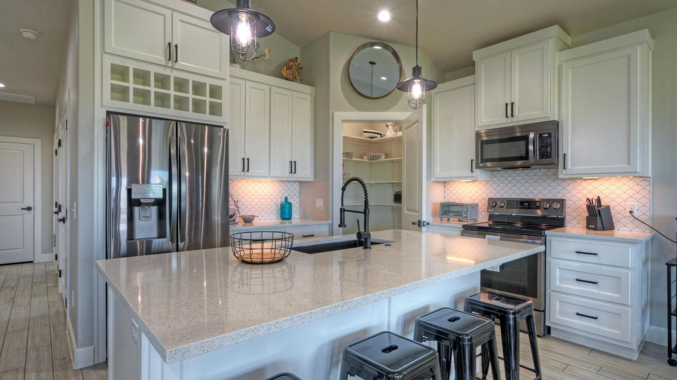 Bayfront Home w Pool Game Room Walk to Beach Golf Cart Access Pelican’s Perch by AvantStay