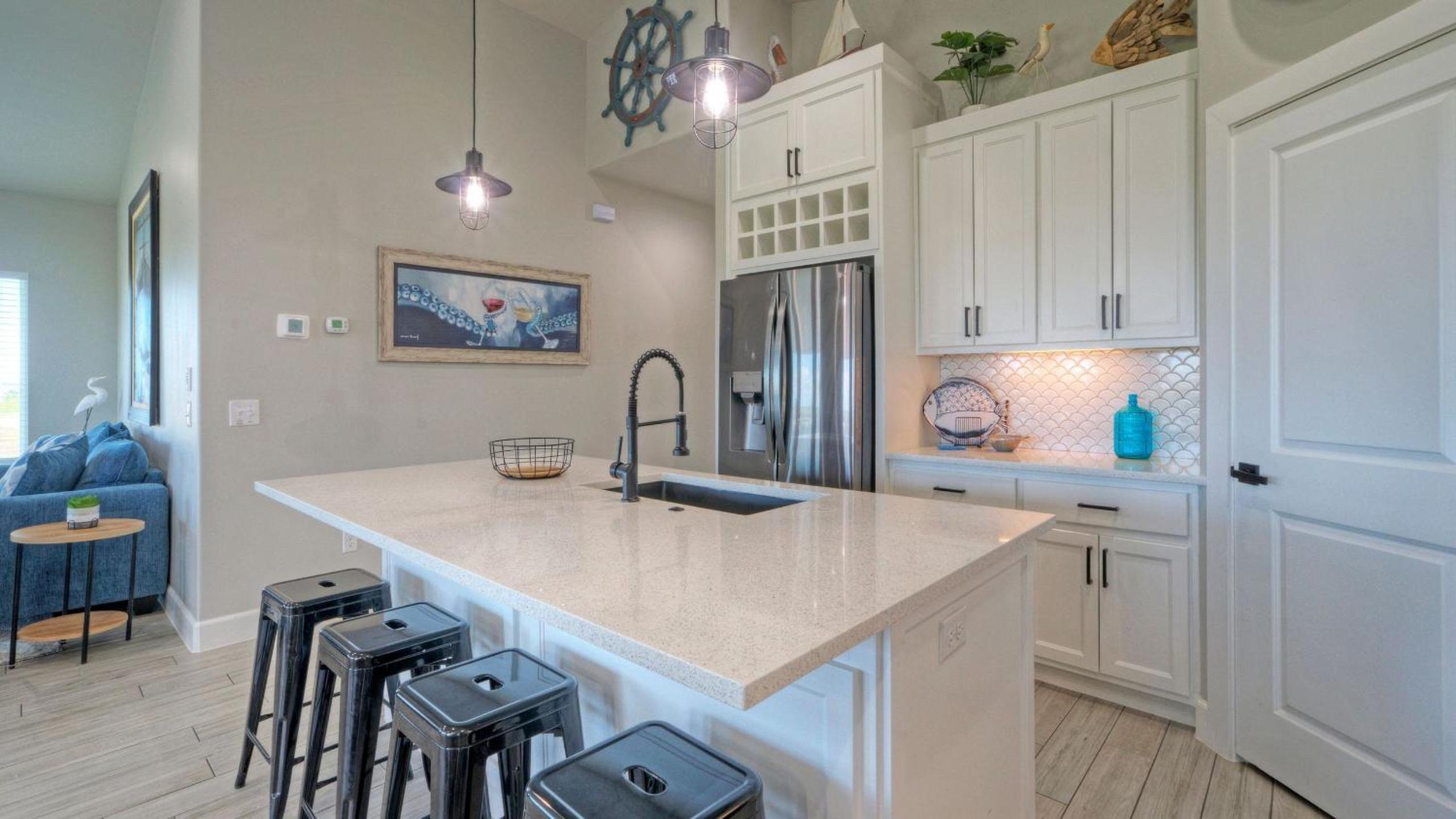 Bayfront Home w Pool Game Room Walk to Beach Golf Cart Access Pelican’s Perch by AvantStay