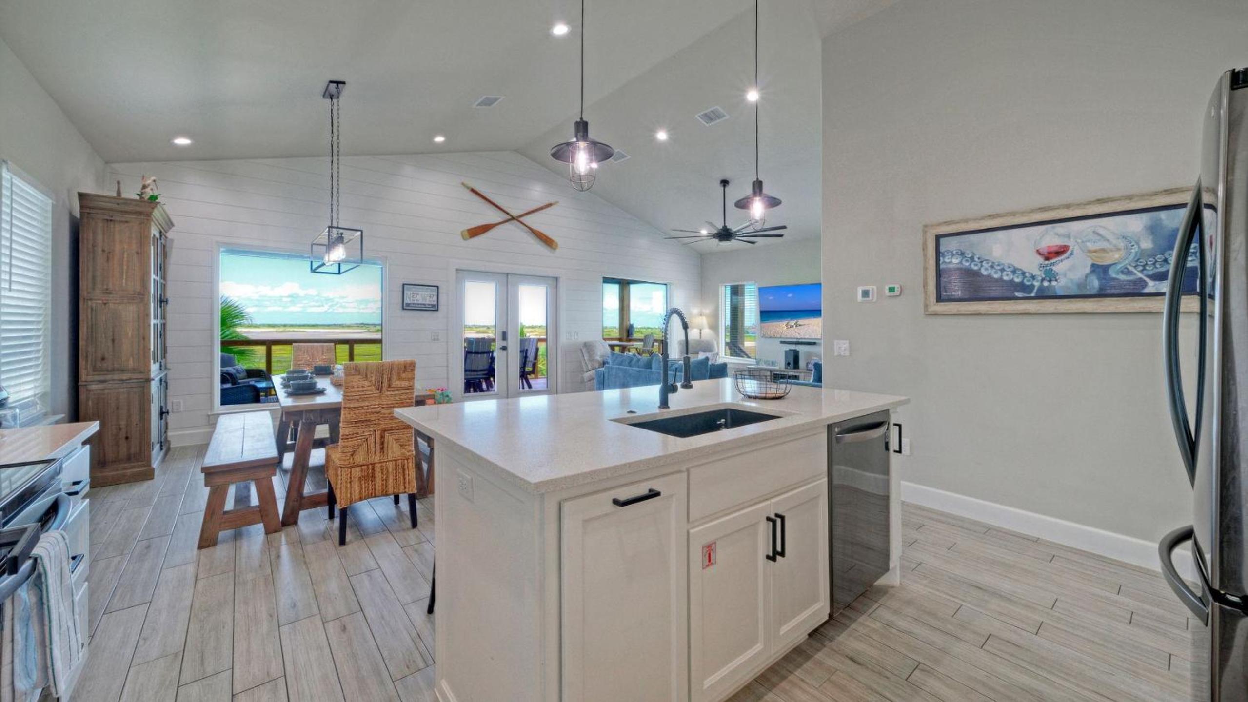 Bayfront Home w Pool Game Room Walk to Beach Golf Cart Access Pelican’s Perch by AvantStay