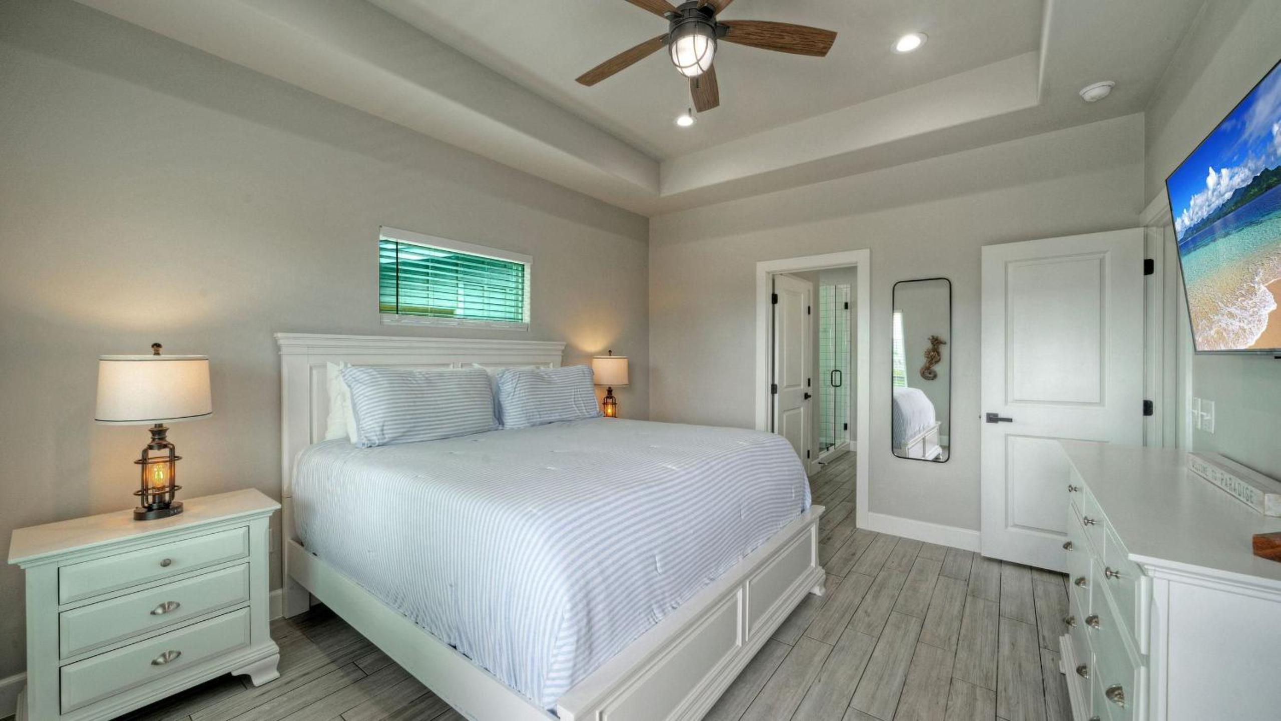 Bayfront Home w Pool Game Room Walk to Beach Golf Cart Access Pelican’s Perch by AvantStay