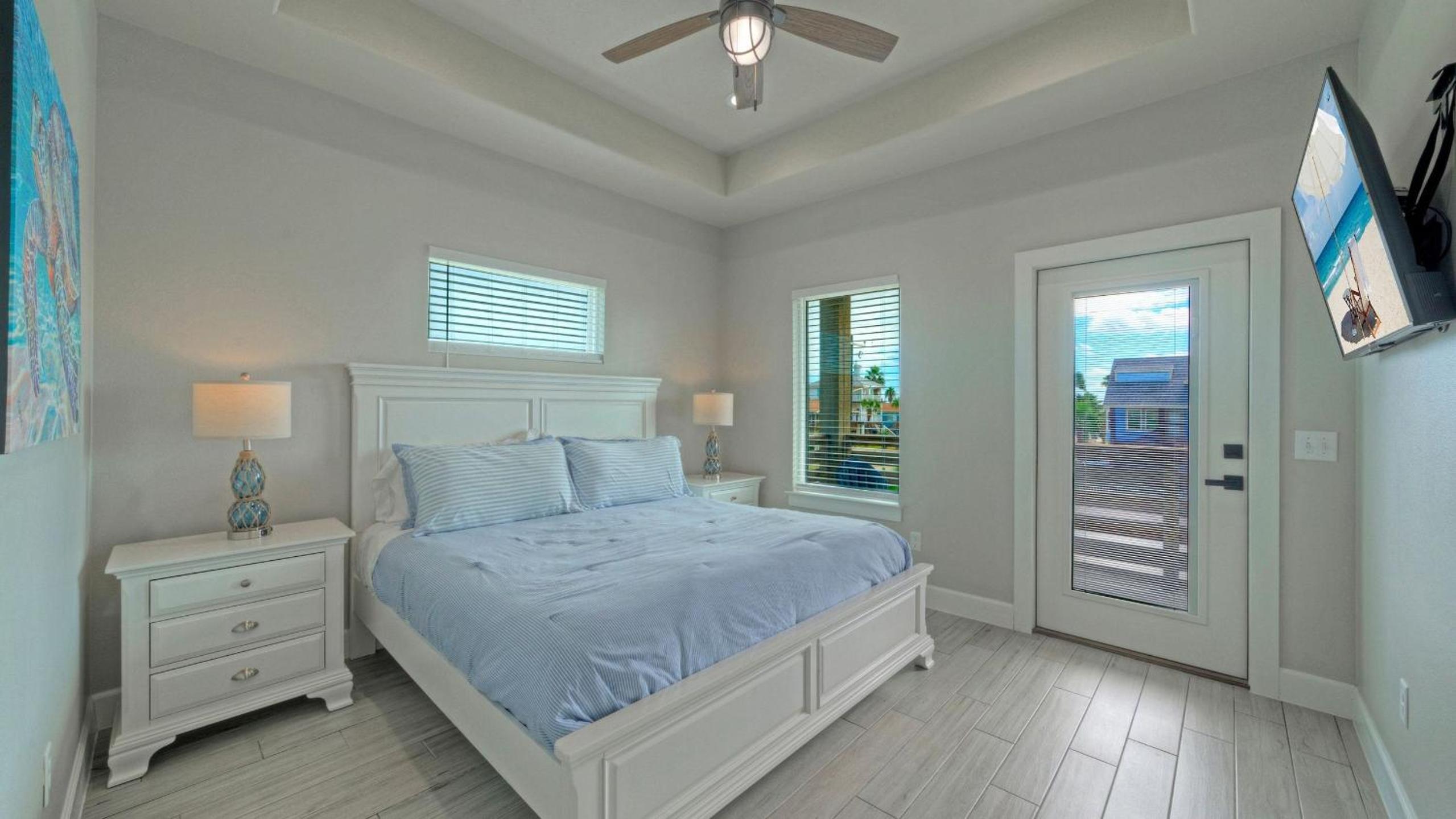 Bayfront Home w Pool Game Room Walk to Beach Golf Cart Access Pelican’s Perch by AvantStay