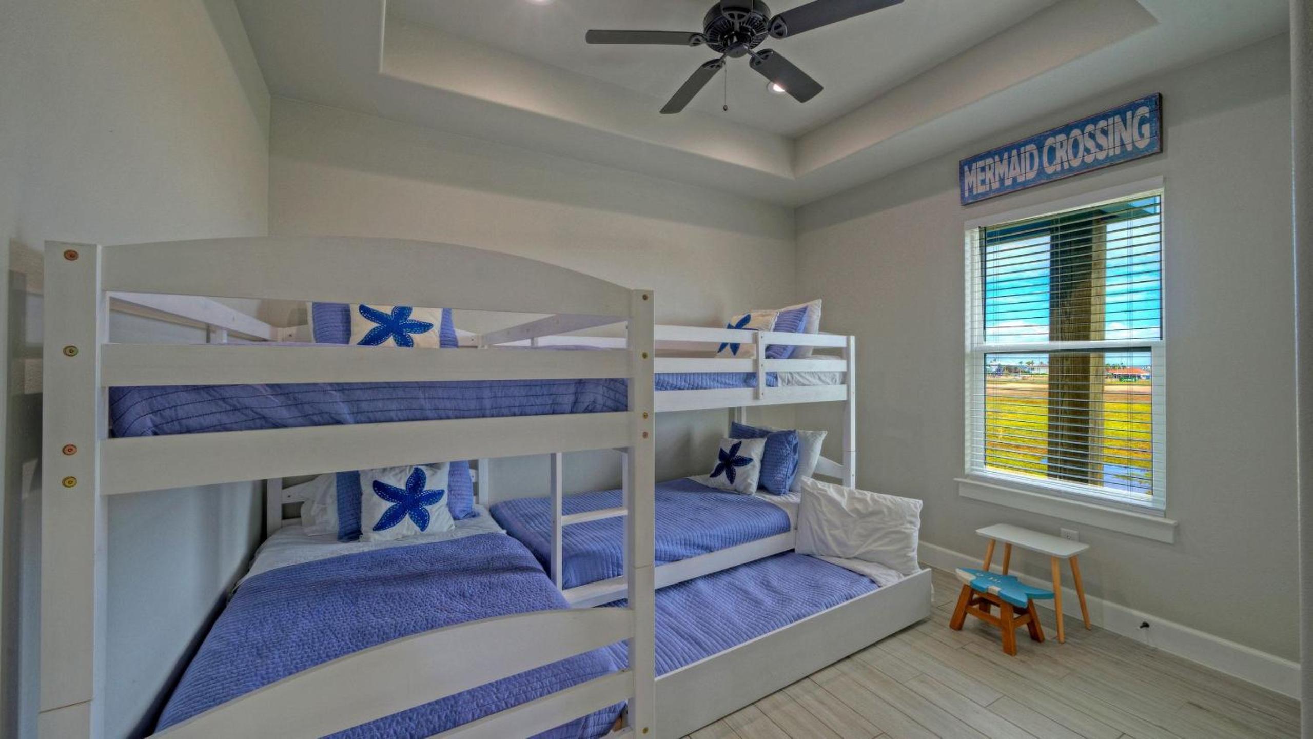 Bayfront Home w Pool Game Room Walk to Beach Golf Cart Access Pelican’s Perch by AvantStay